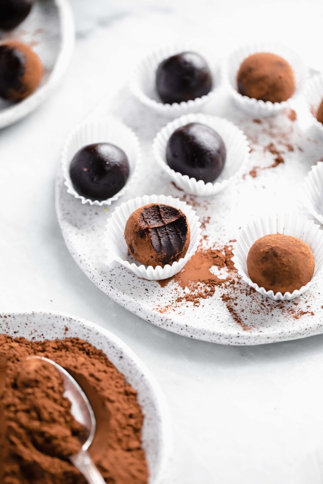 You'd never know these fudgy healthy vegan brownies truffles are raw, refined sugar free, AND gluten free. They're a chocolate lovers dream.