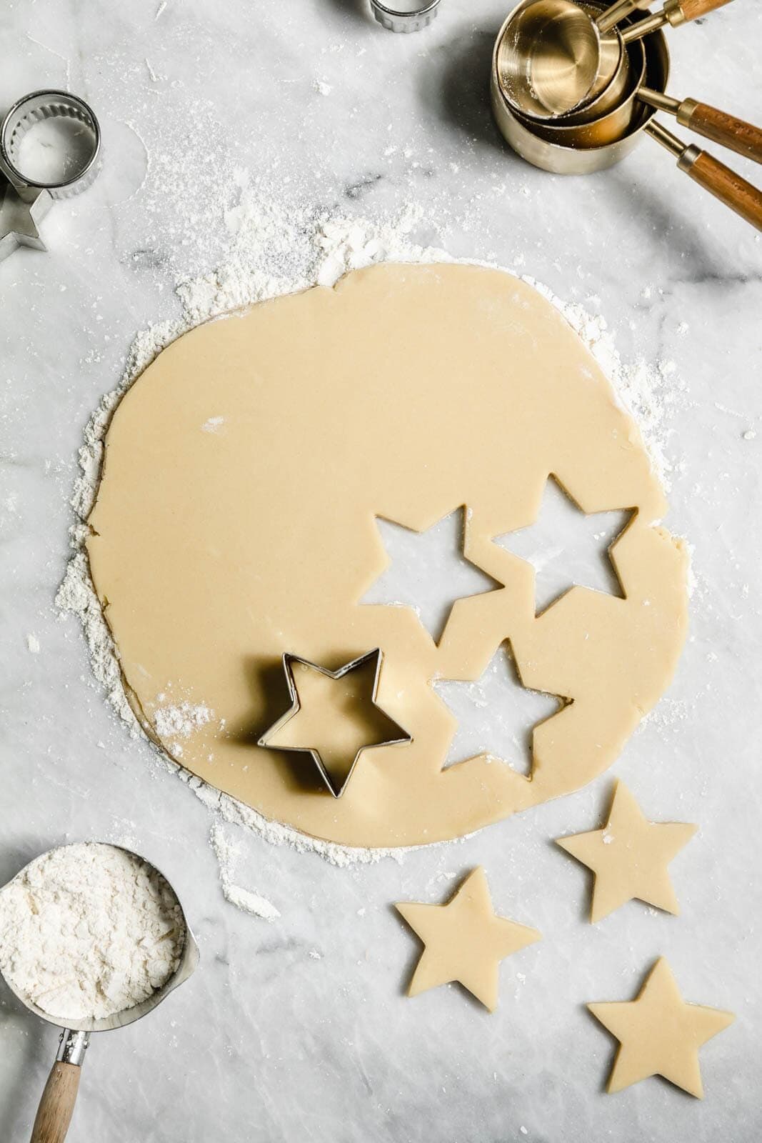 Get back to basics with these perfect cut out sugar cookie. Dense, and chewy, with a crispy edge and a gooey center, you won't be disappointed!