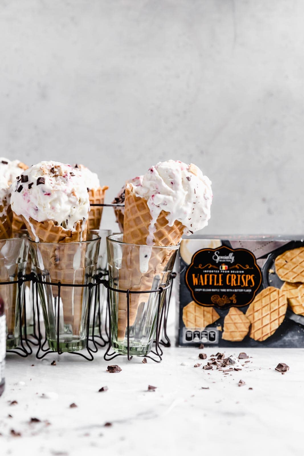 This creamy vanilla ice cream with fat blackberry swirls, buttery waffle pieces, and chocolate chips has us in heaven. Whip up this no churn blackberry waffle chocolate chip ice cream in minutes and skip the line at the ice cream shop.