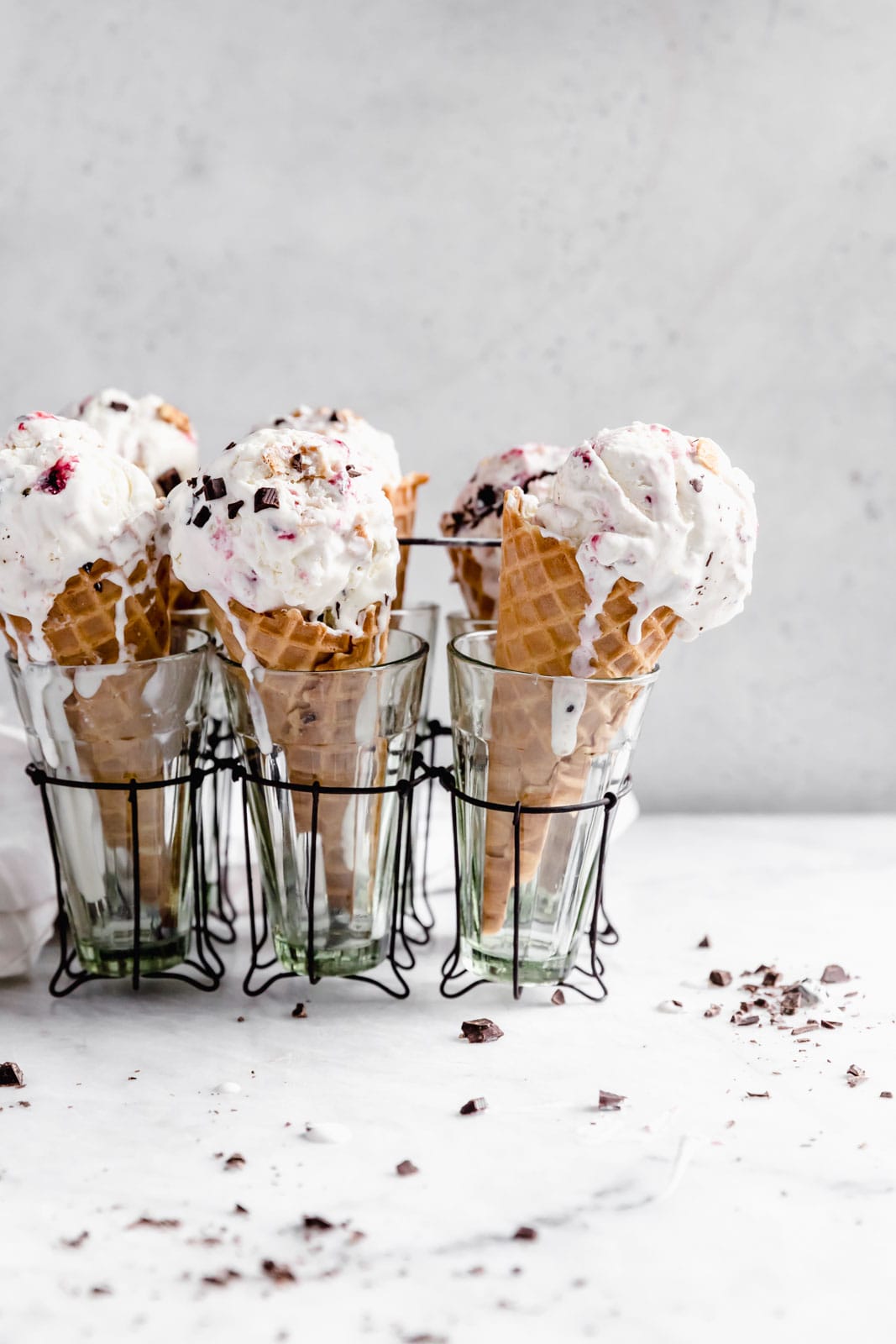 This creamy vanilla ice cream with fat blackberry swirls, buttery waffle pieces, and chocolate chips has us in heaven. Whip up this no churn blackberry waffle chocolate chip ice cream in minutes and skip the line at the ice cream shop.