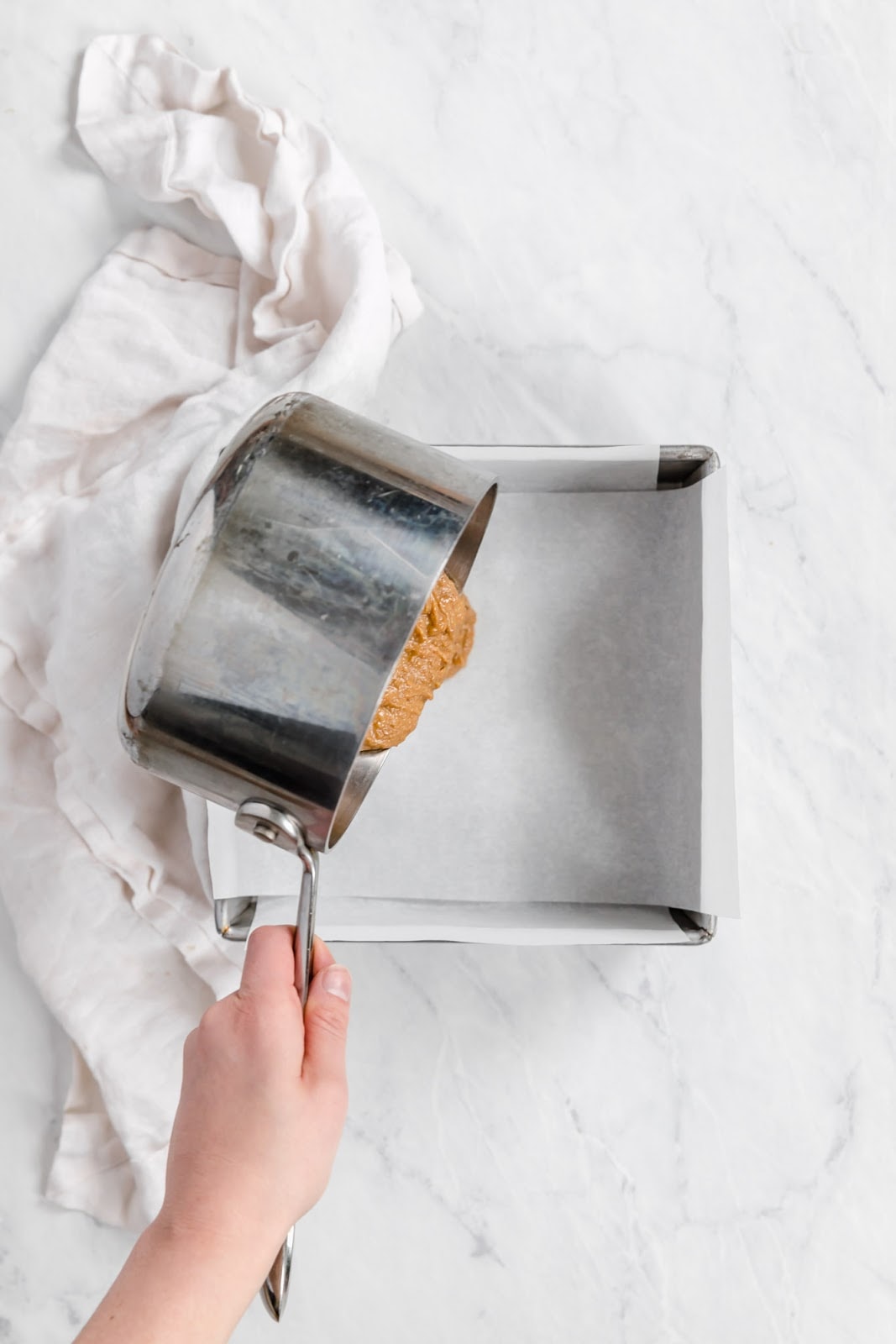pour peanut butter mixture into pans