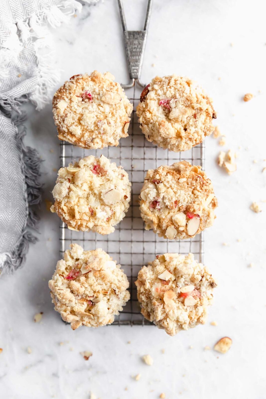 Looking for your new favorite spring muffin recipe? We gotcha covered. These Almond rhubarb muffins are tender, moist and packed with chunks of rhubarb. YUM