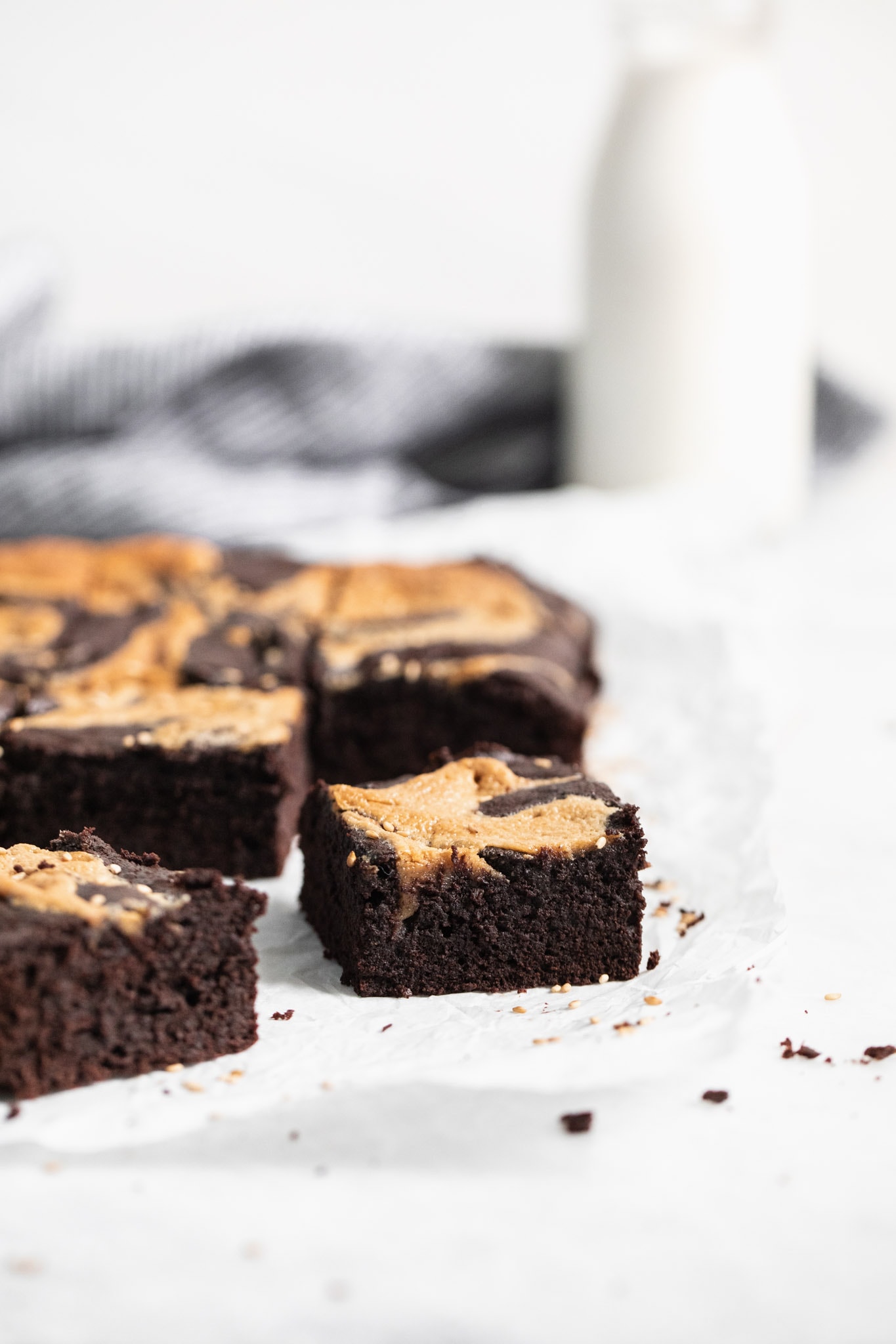 Introducing Halva Brownies AKA thick fudgy brownies swirled with ribbons of halva, my favorite middle eastern confection. Think tahini brownies, but better!