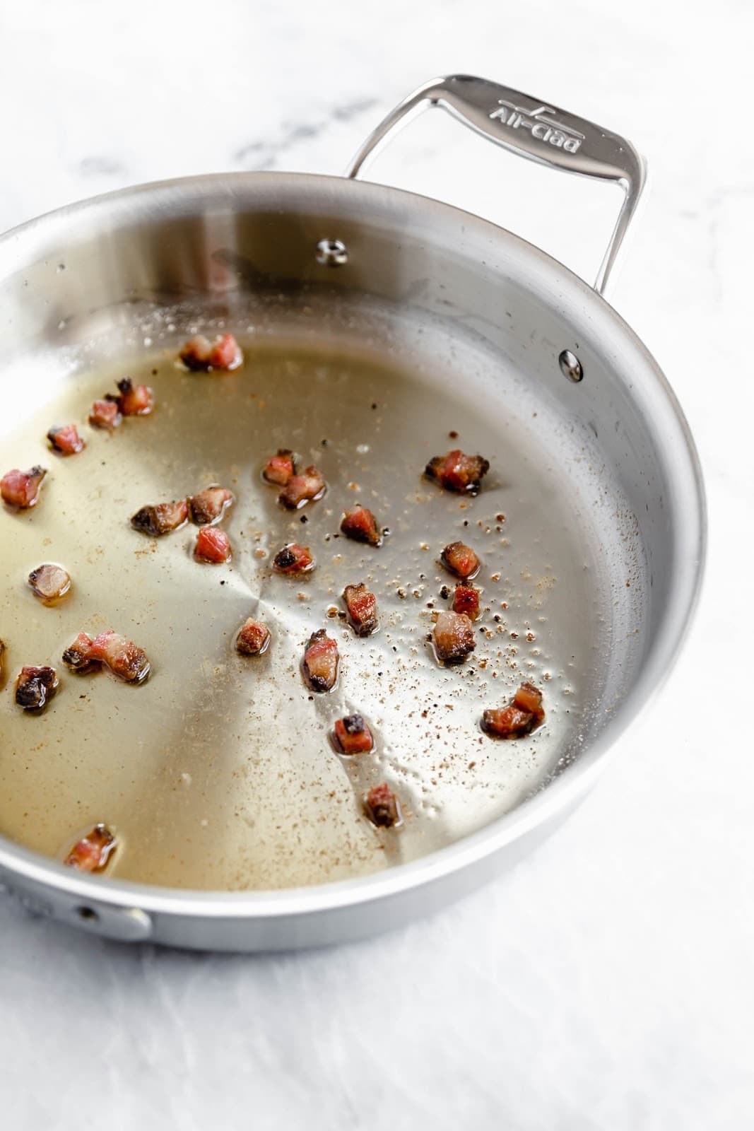 A creamy Roman classic made with bucatini, guanciale, parmigiano, and egg yolks, this Date Night Pasta Carbonara is perfectly portioned for two!
