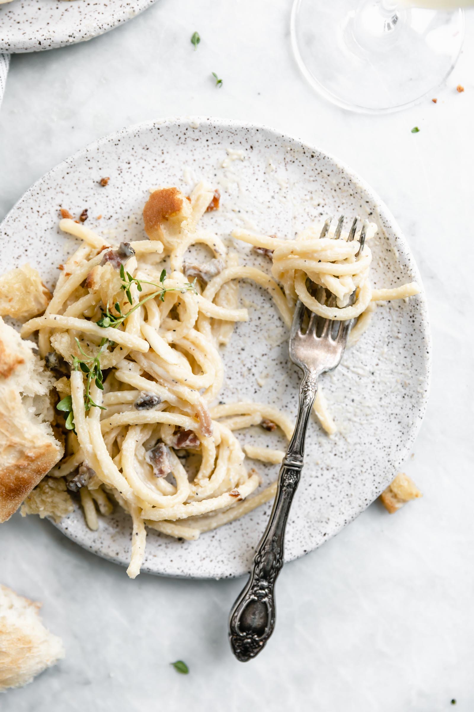 A creamy Roman classic made with bucatini, guanciale, parmigiano, and egg yolks, this Date Night Pasta Carbonara is perfectly portioned for two!