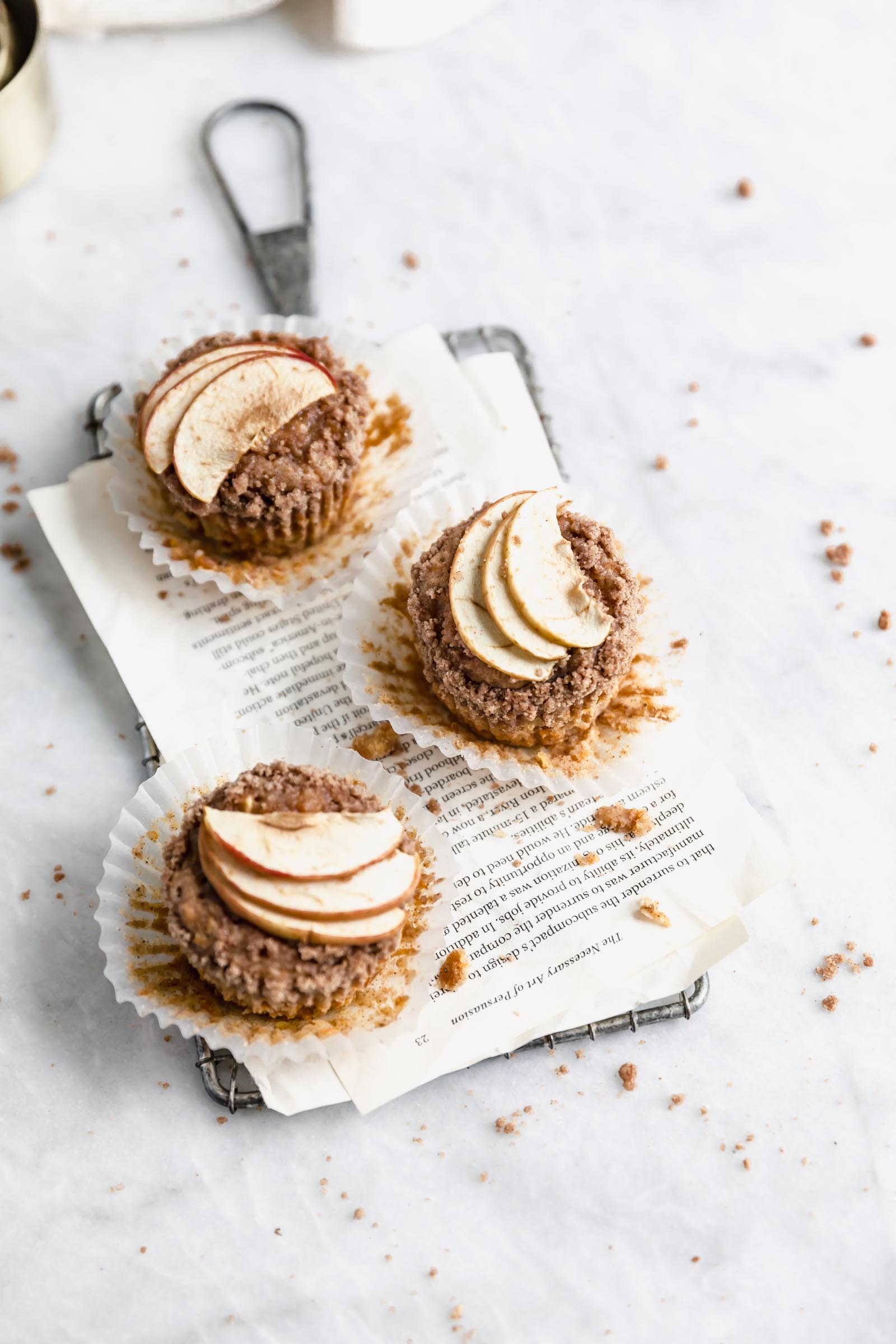 apple carrot muffins from overhead on a small cooling rack