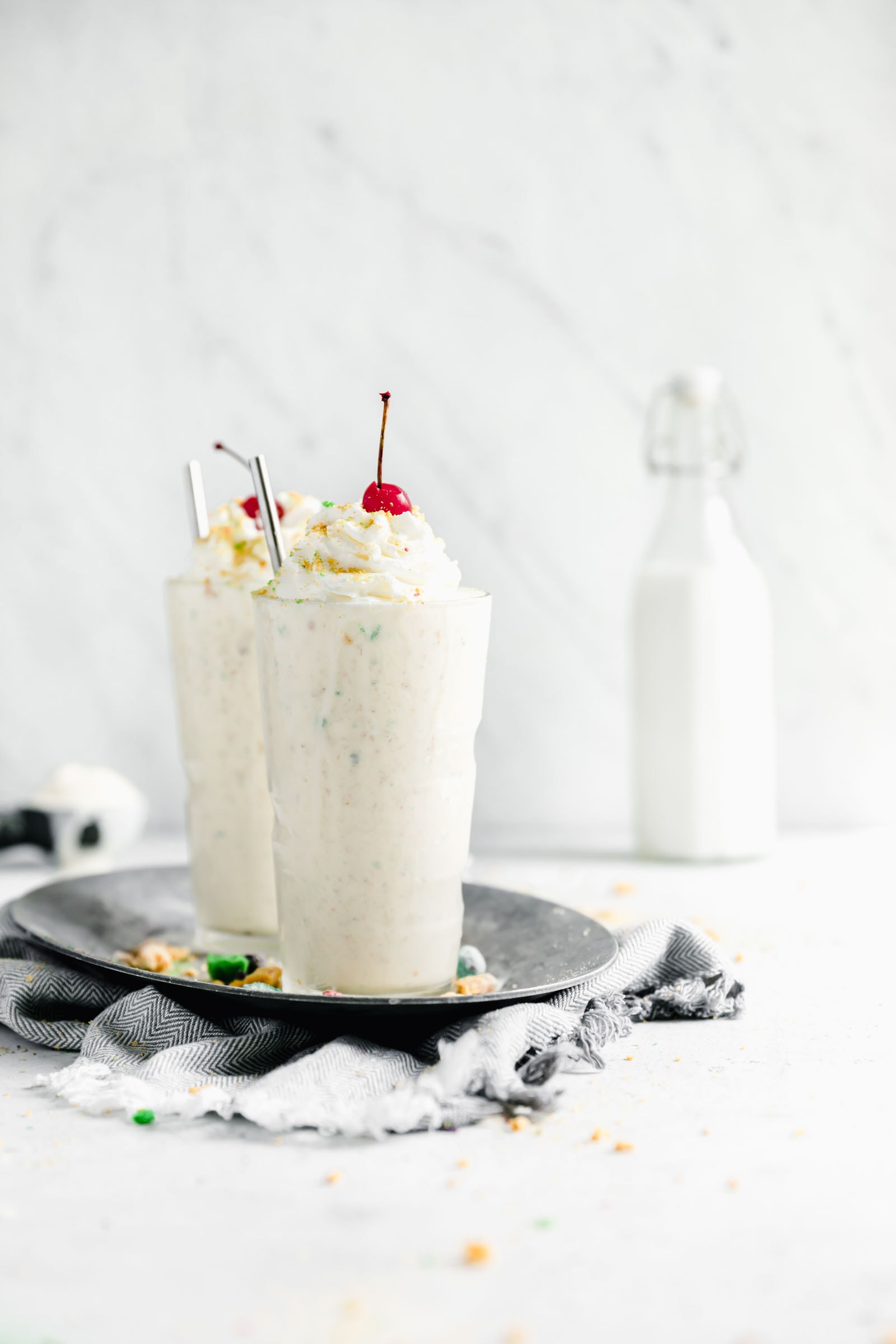 captain crunch milkshake with whipped cream and cherry