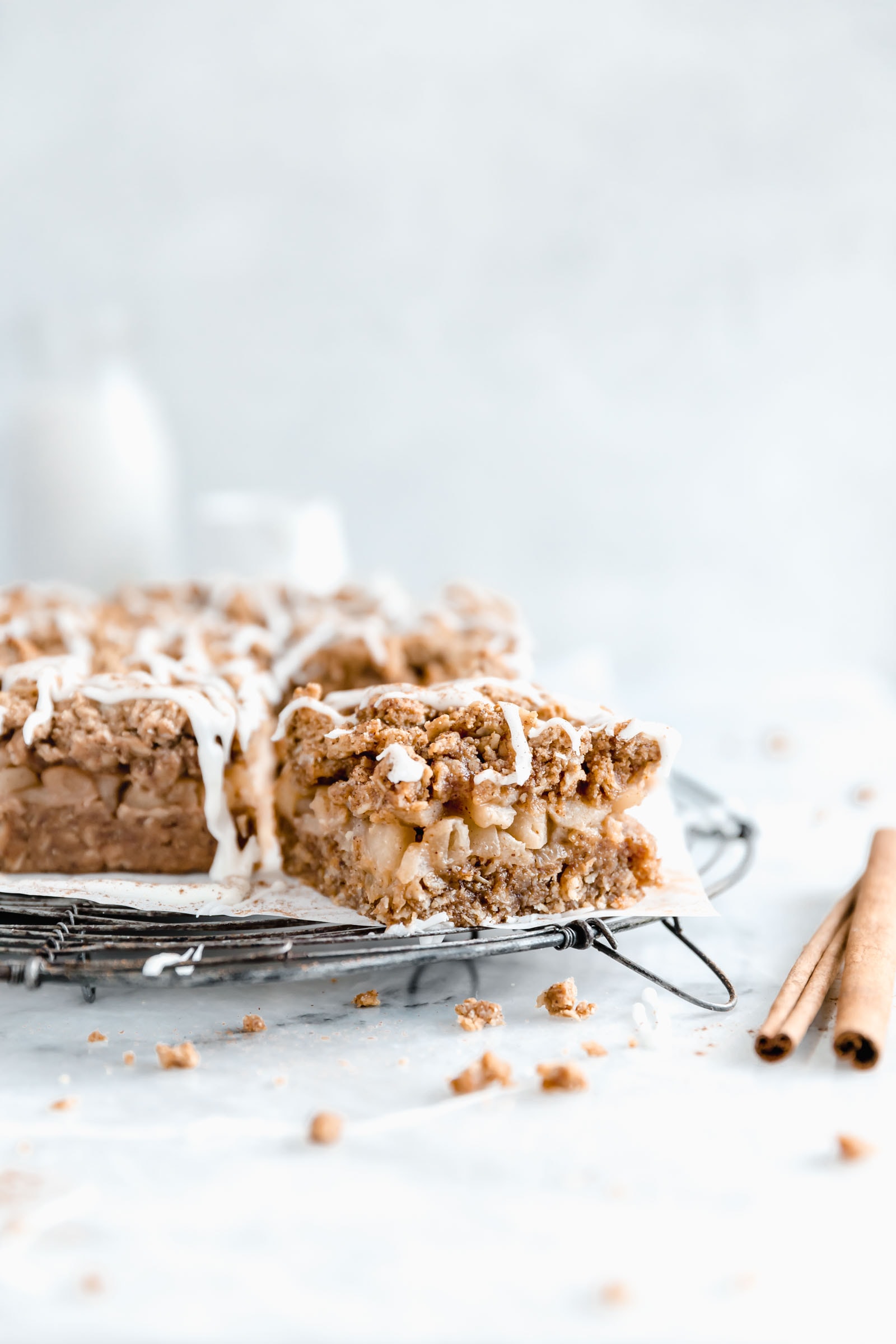 Healthy apple pie bars with one slice out from the pan