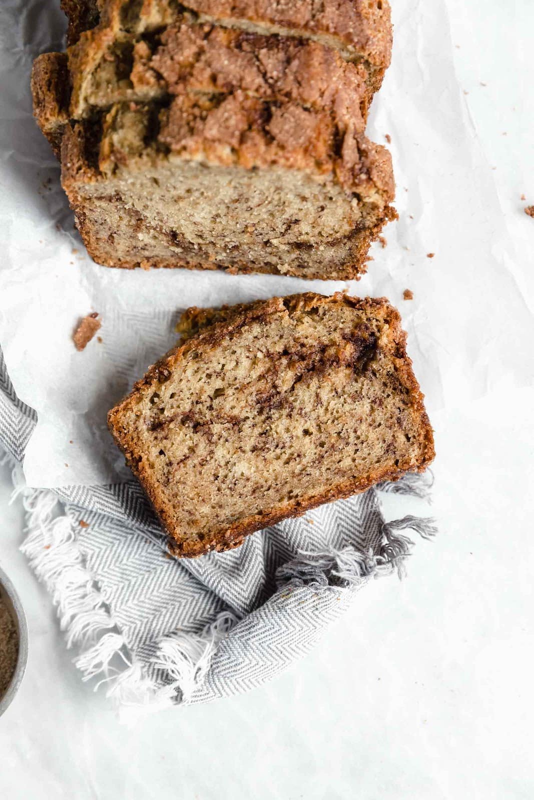 overhead shot of slice of snickerdoodle banana bread