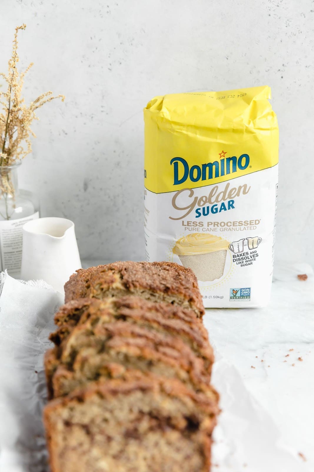 slices of snickerdoodle banana bread with domino golden sugar