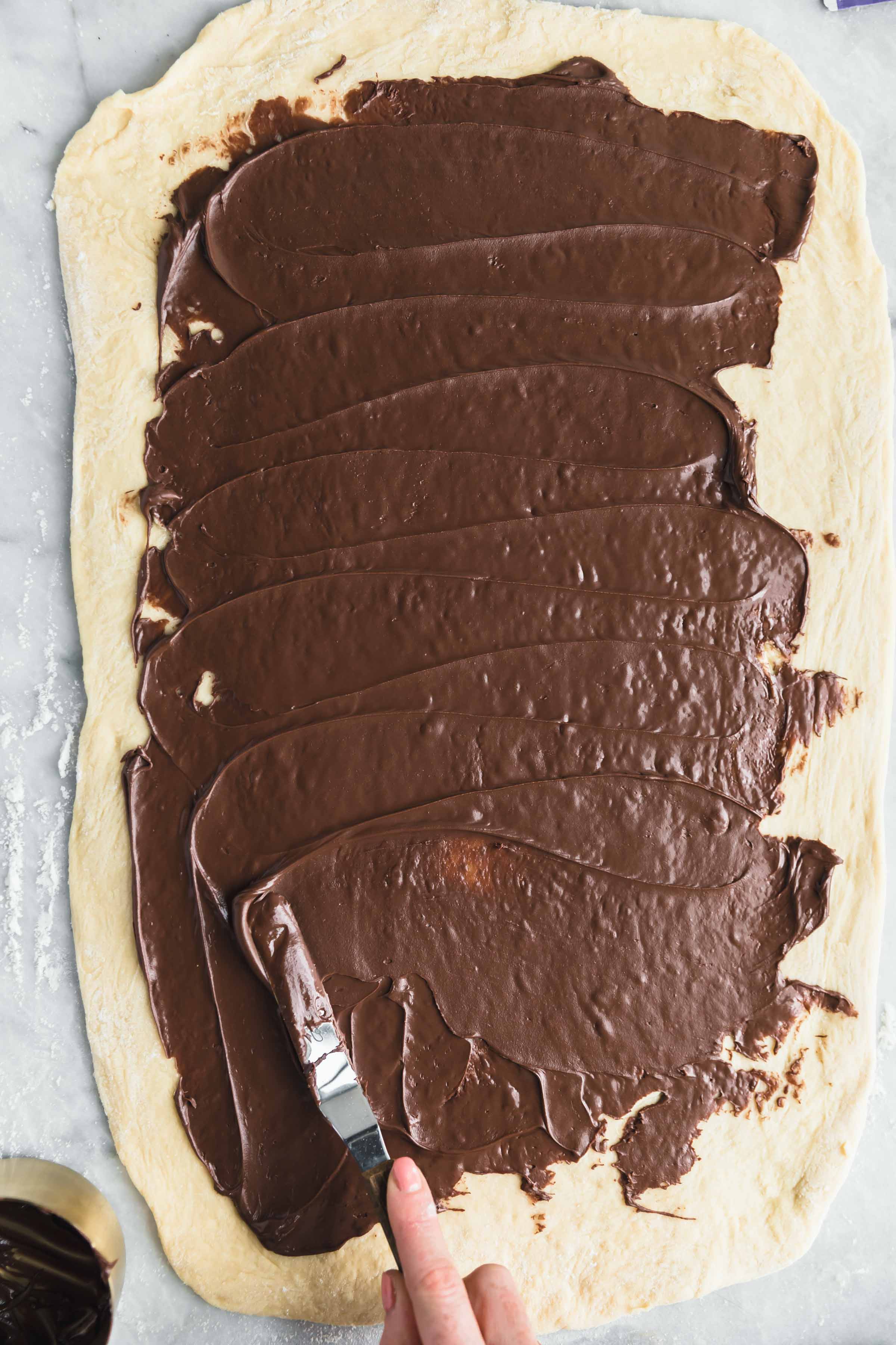 spread the chocolate spread using an offset spatula
