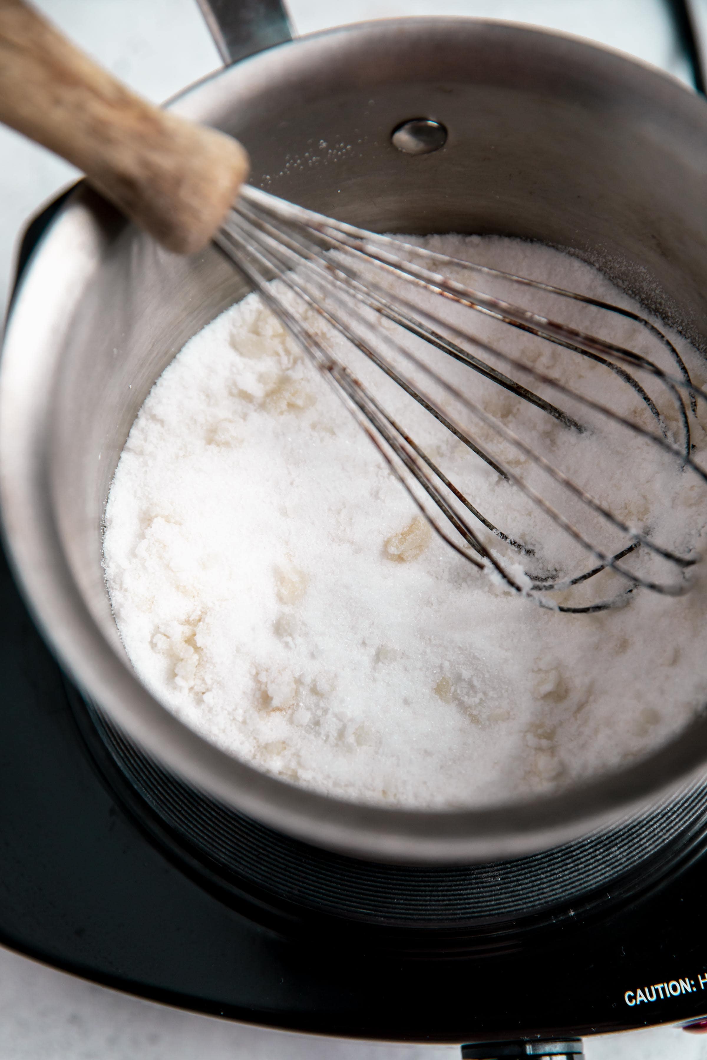 homemade caramel stage one sugar begins to clump