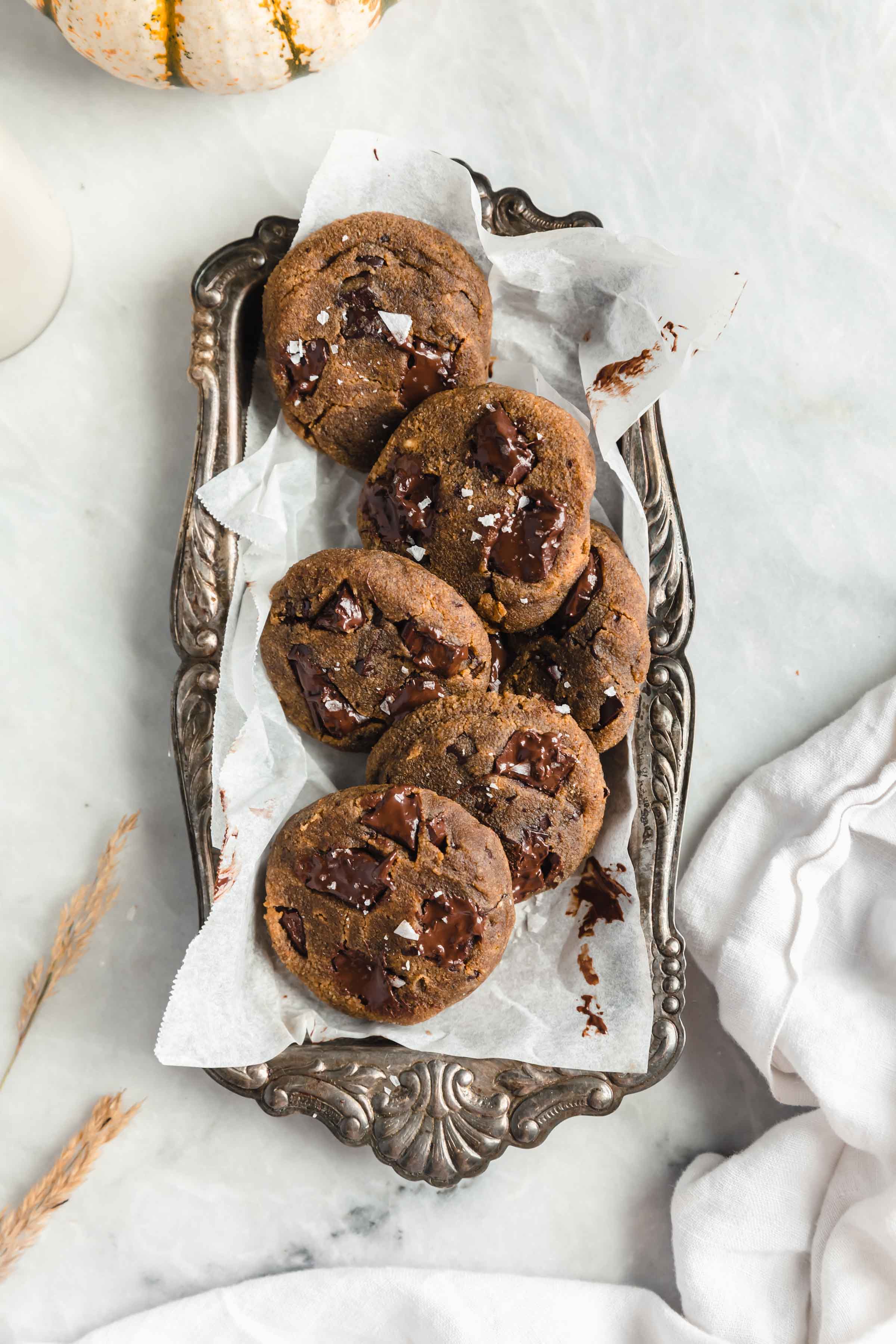 paleo pumpkin chocolate chip cookies on a tin