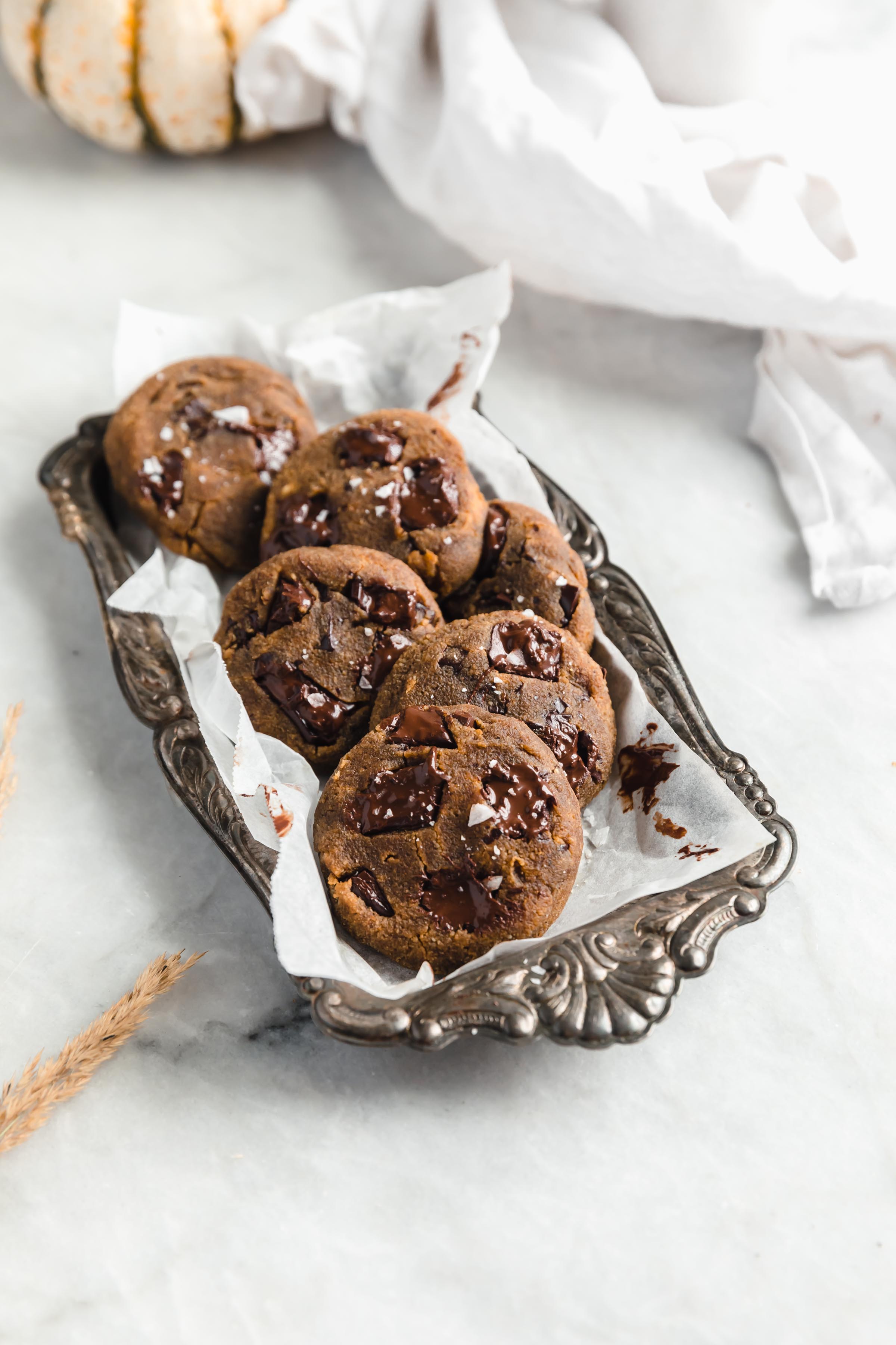 flourless pumpkin chocolate chip cookies in a tin