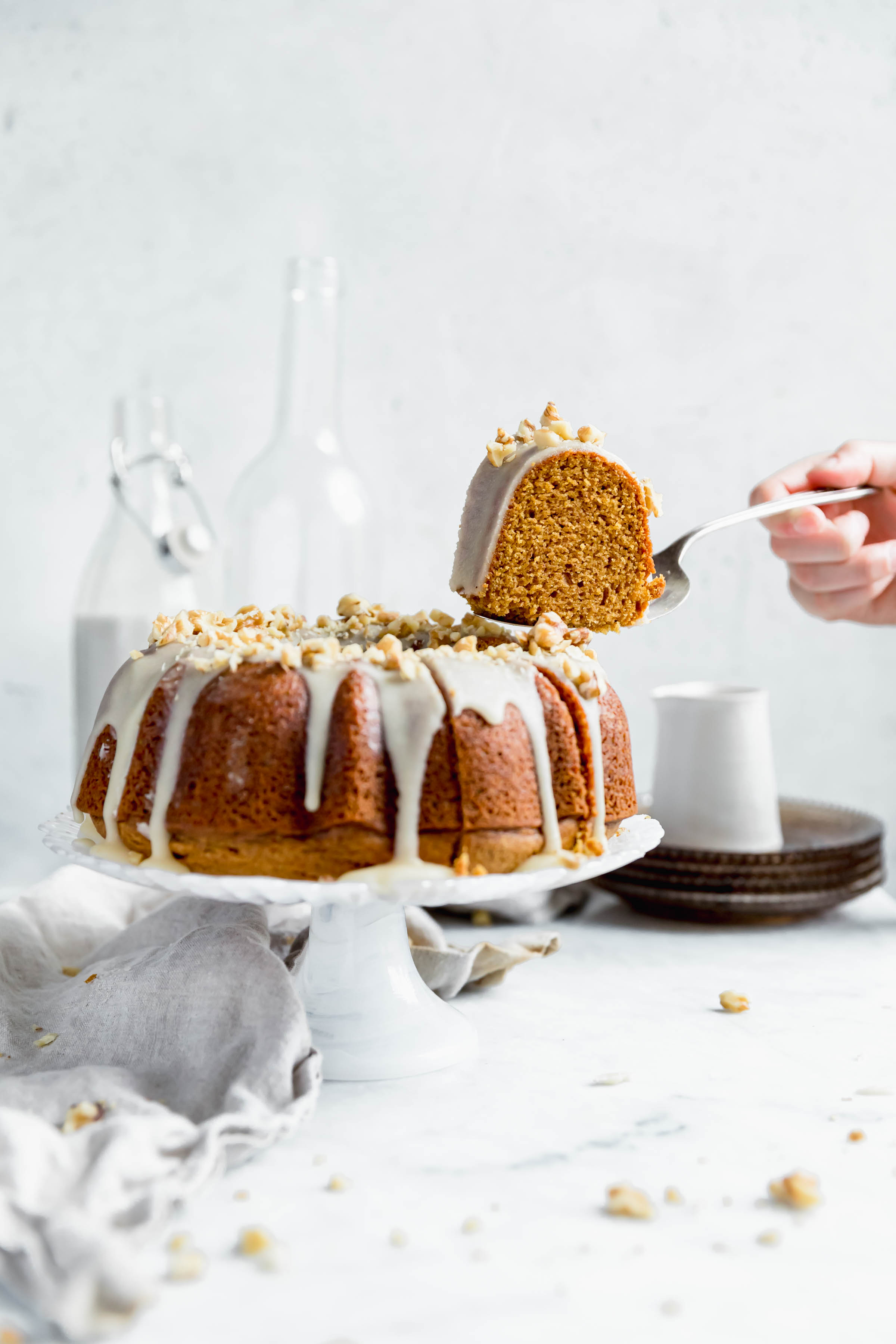 sweet potato bundt cake with a piece cut out