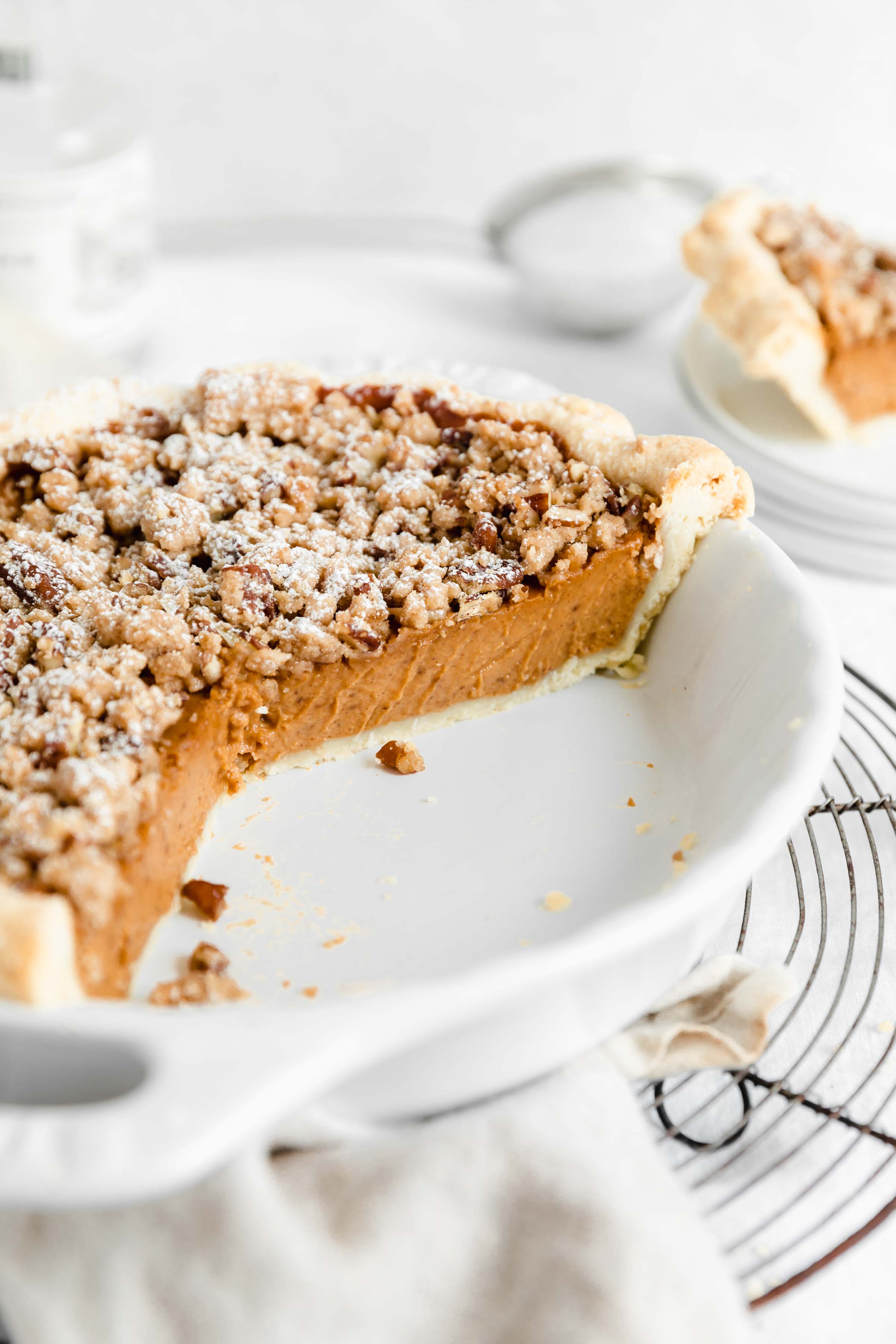 Creamy sweet potato pie with a delicious, crunchy almond streusel. Perfect for the holidays or using up some leftover sweet potatoes!
