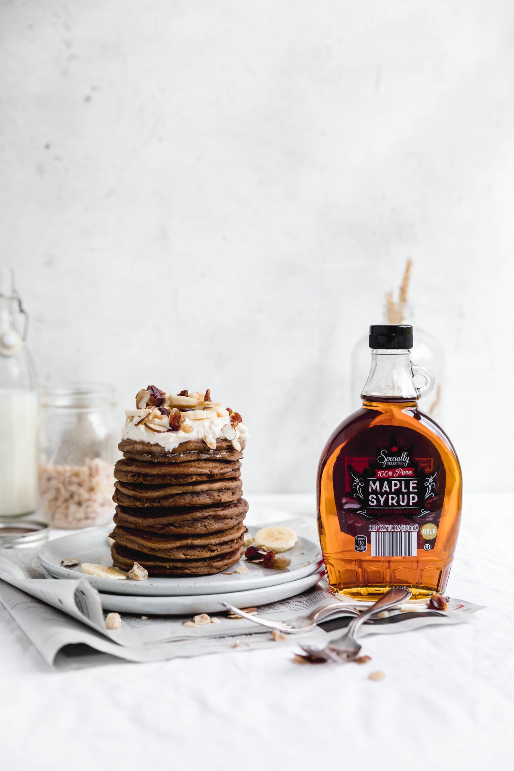 Start your Christmas morning off right with a fat stack of these fluffy gingerbread pancakes. Topped with a healthy pour of maple syrup, these pancakes are perfect for the holidays!