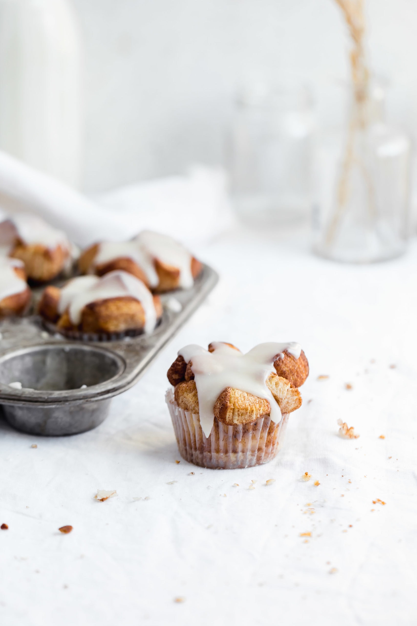 monkey bread muffins drizzled with a vanilla glaze