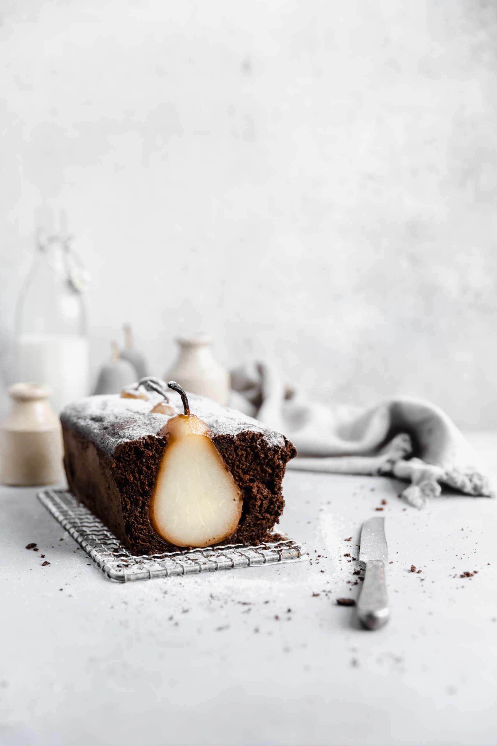cross section of poached pear gingerbread loaf cake