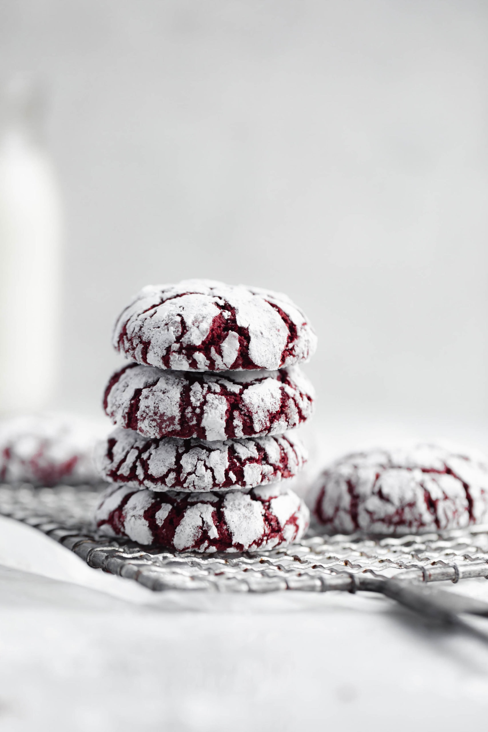 stack of red velvet crinkle cookies