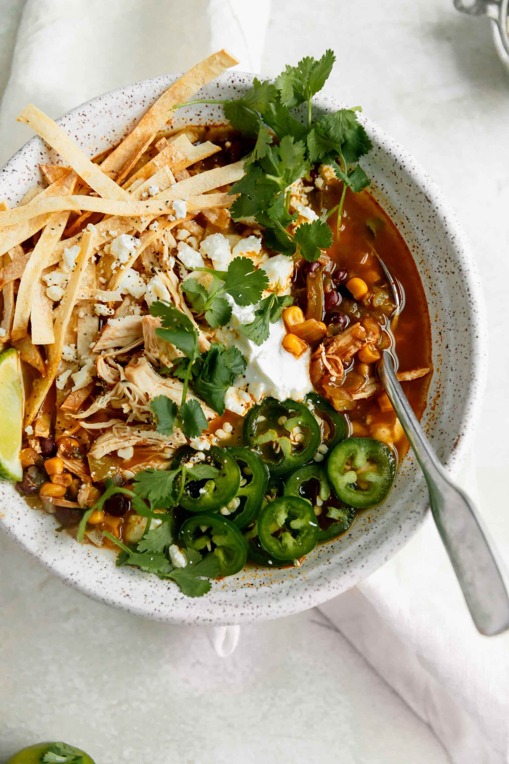 homemade chicken tortilla soup in a bowl