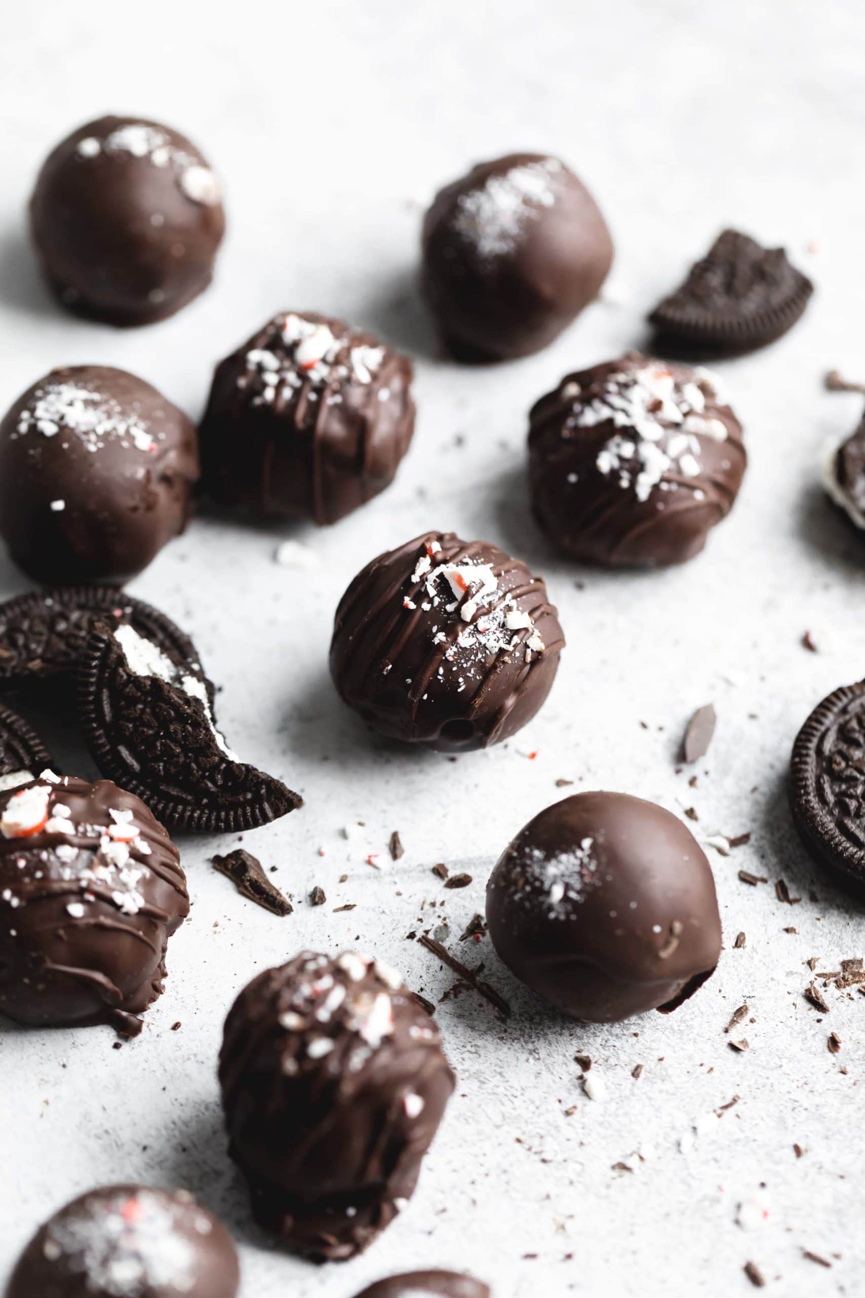 oreo peppermint truffles dipped in chocolate and sprinkled with crushed peppermint
