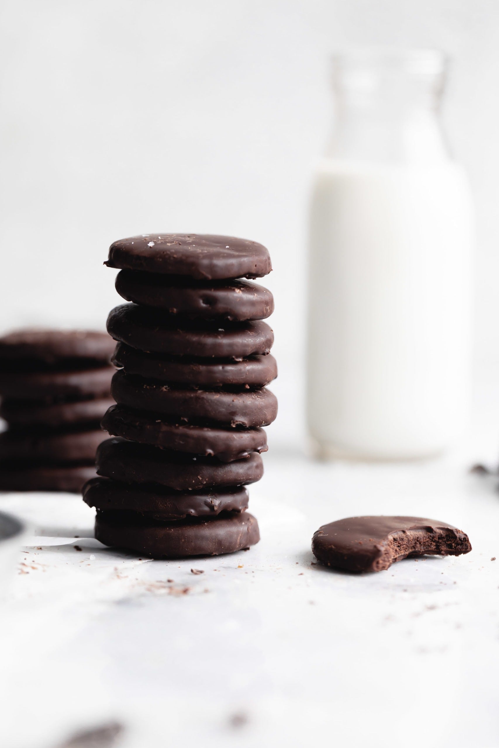 stack of healthy thing mints with a glass of milk
