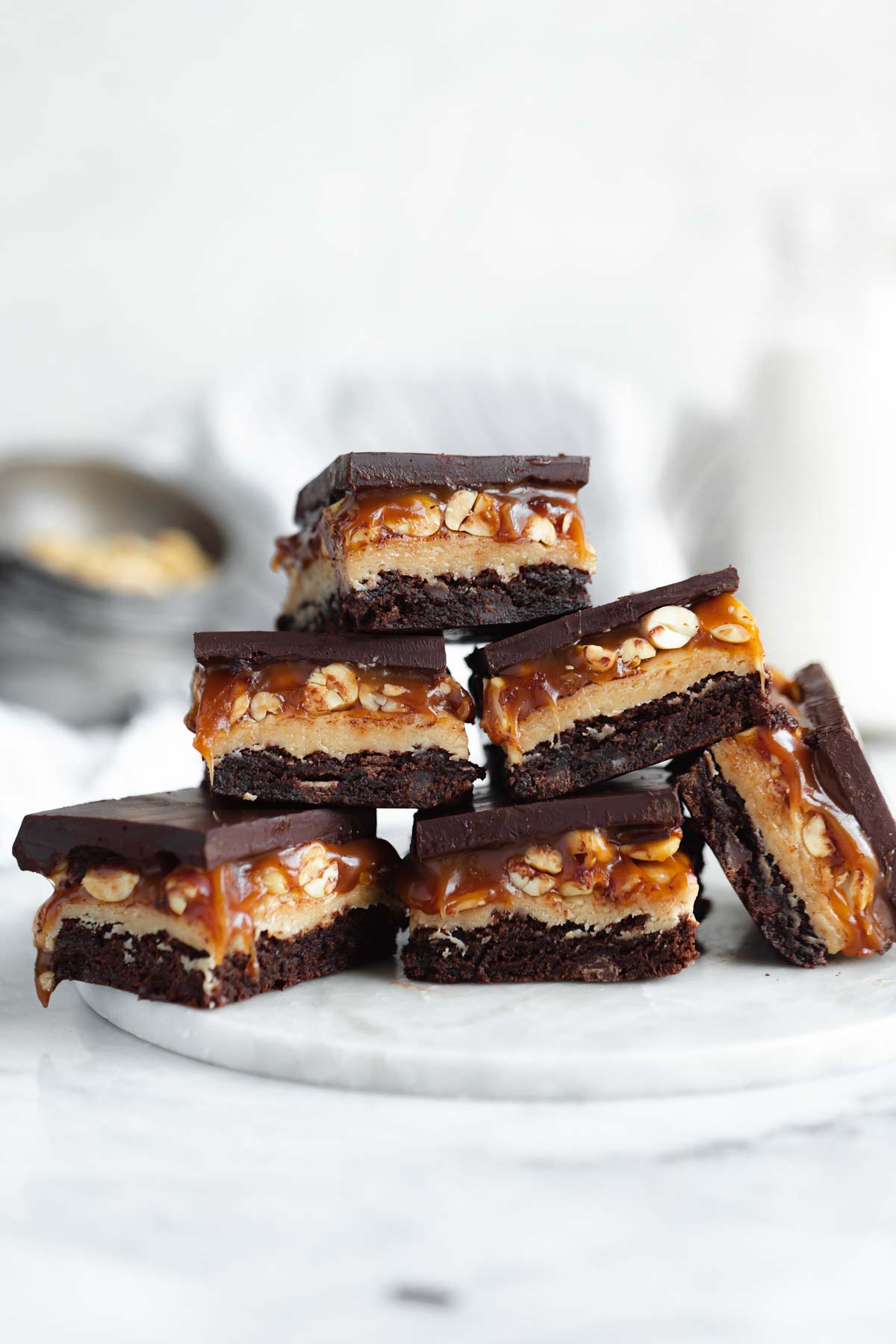 stacked pyramid of homemade snickers brownies