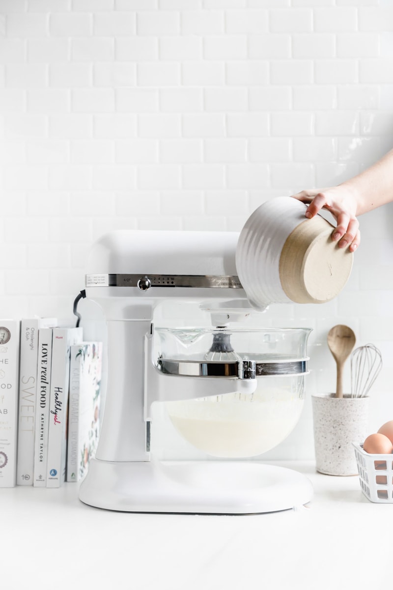 dry ingredients pouring into batter