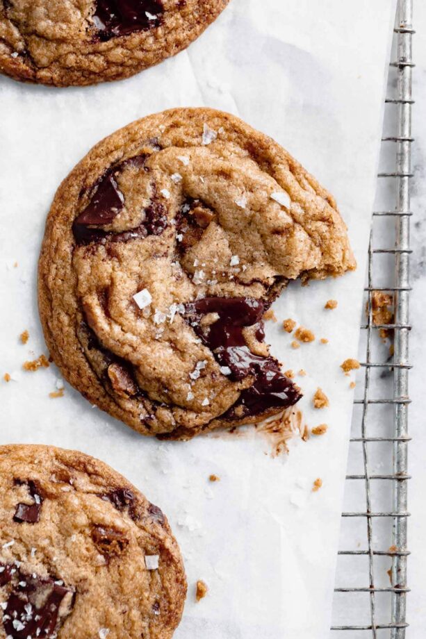 brown butter toffee chocolate chip cookie with a bite taken out