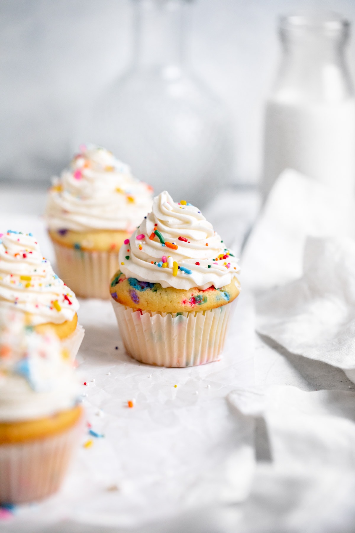 funfetti cupcakes with a glass of milk