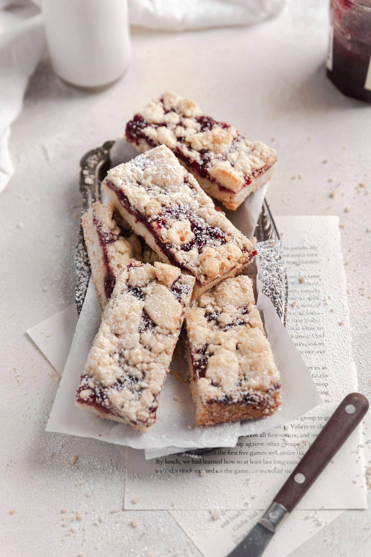 raspberry crumble bars cut into squares