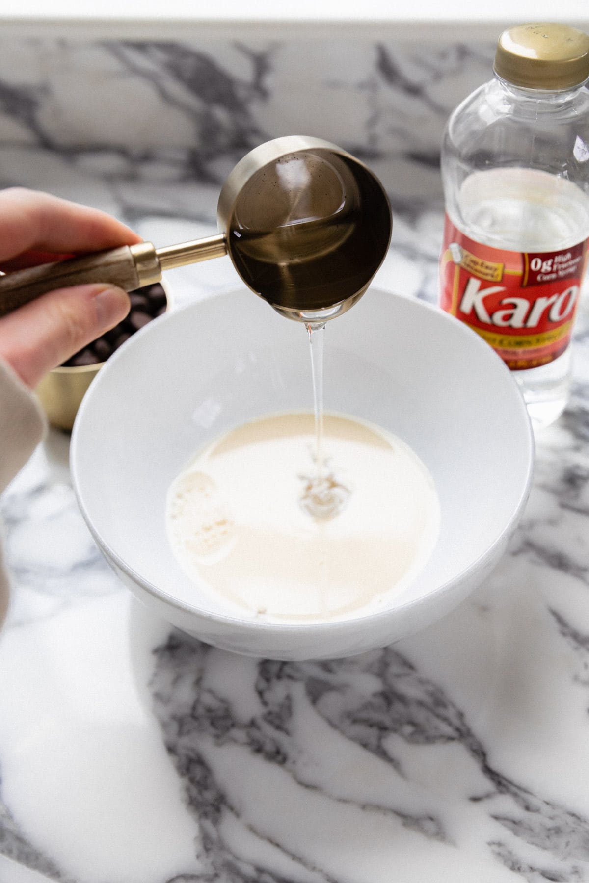 corn syrup pouring into bowl