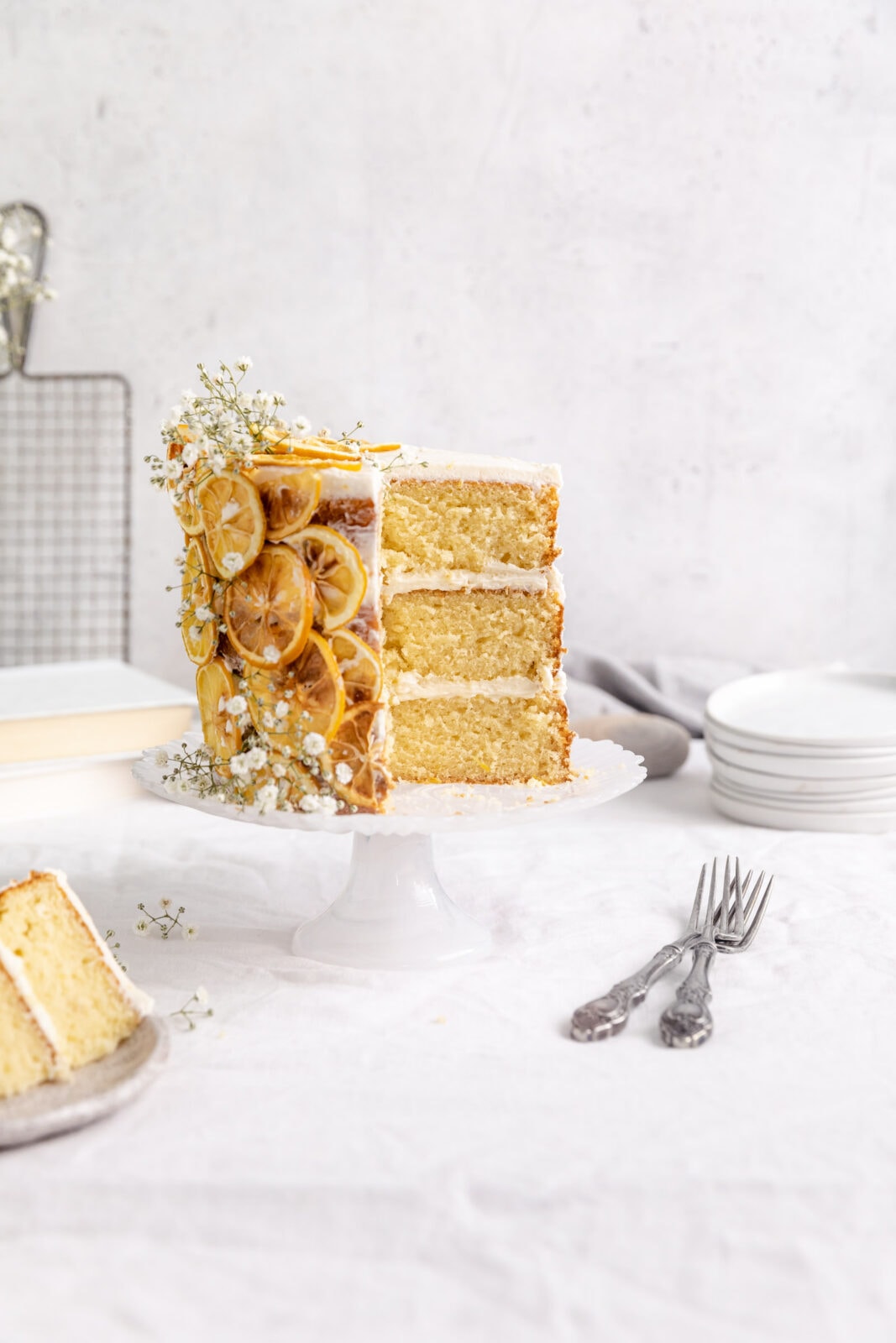 lemon layer cake on a cake stand