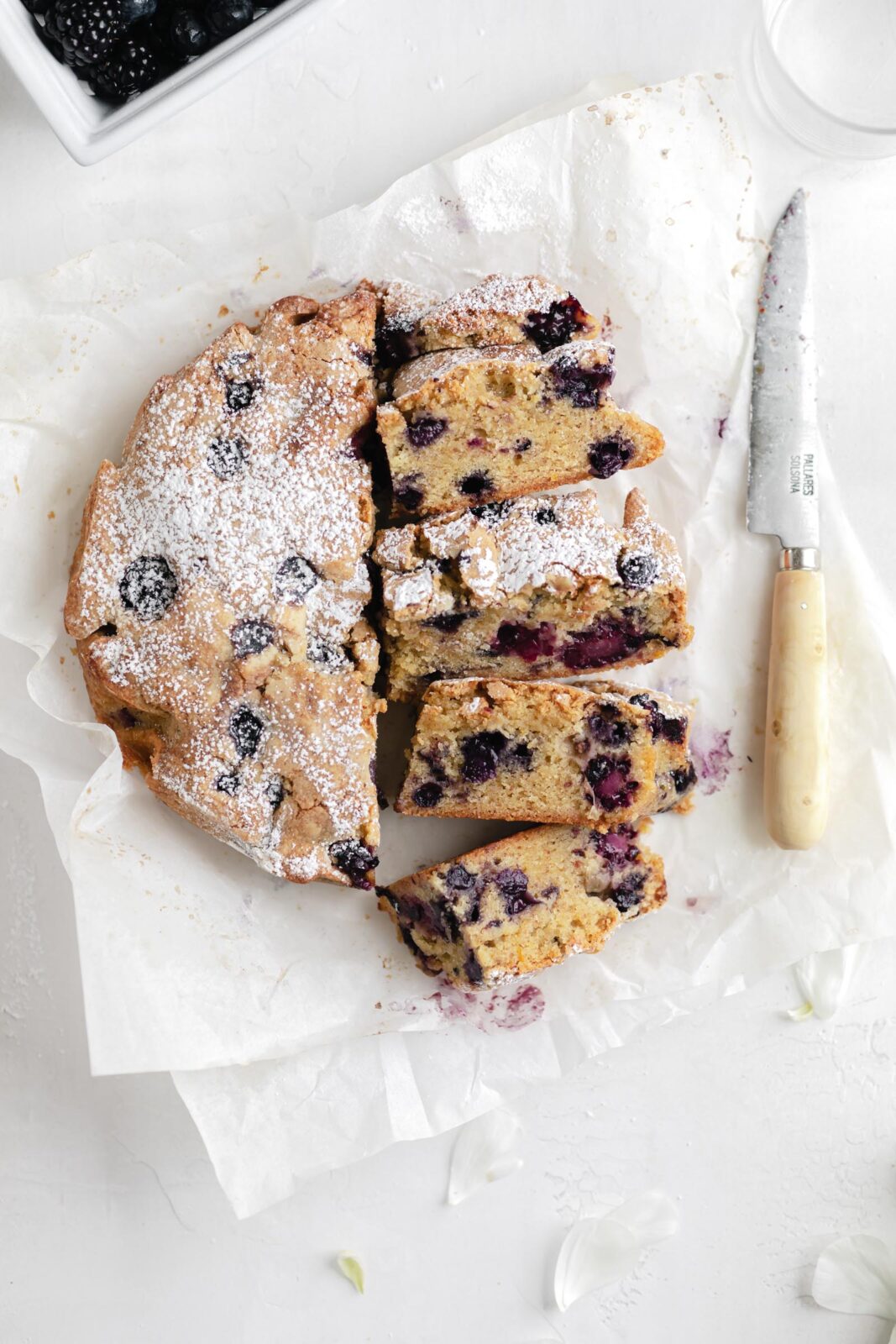 olive oil cake slices with knife