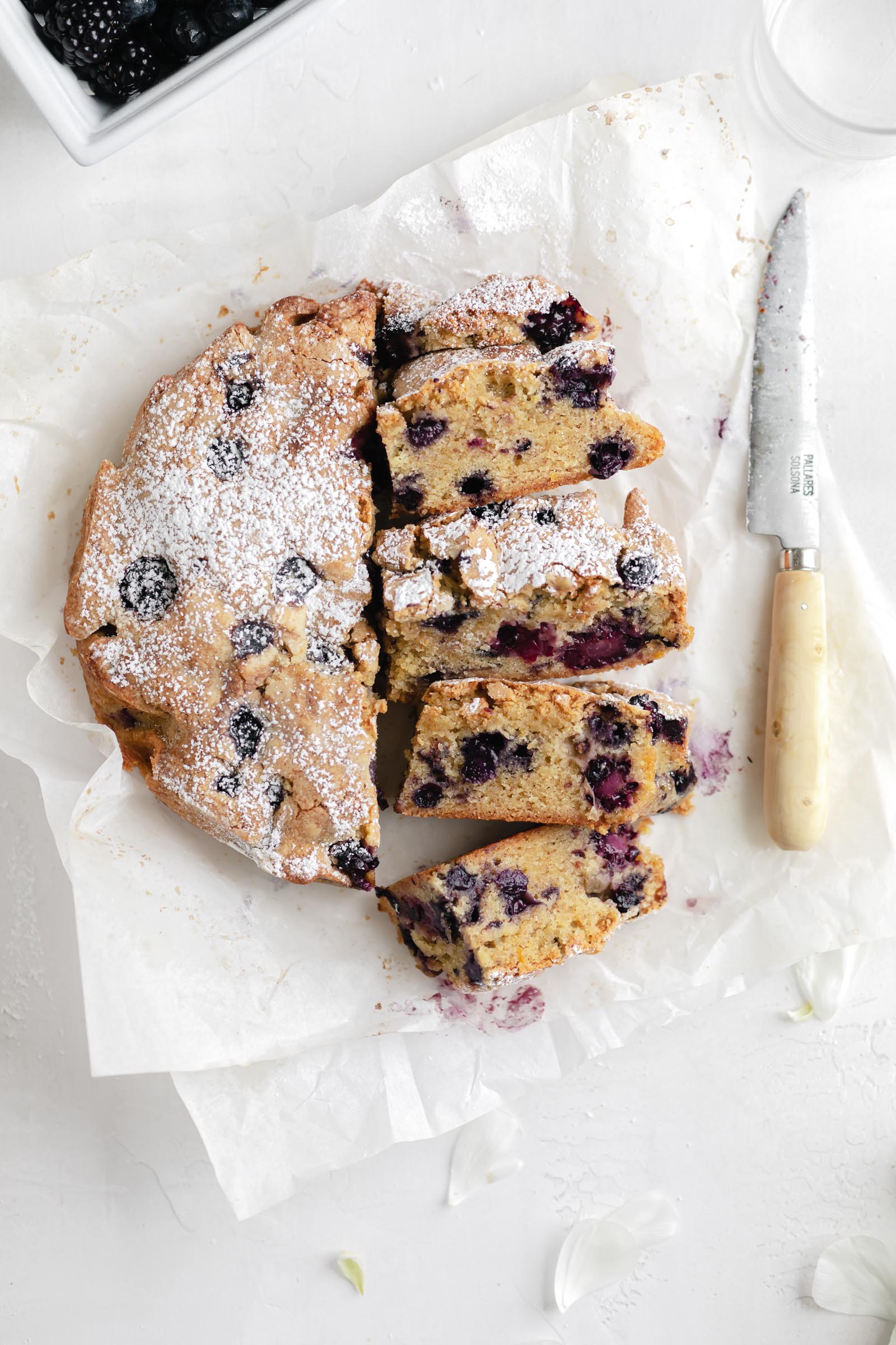 olive oil cake slices with knife