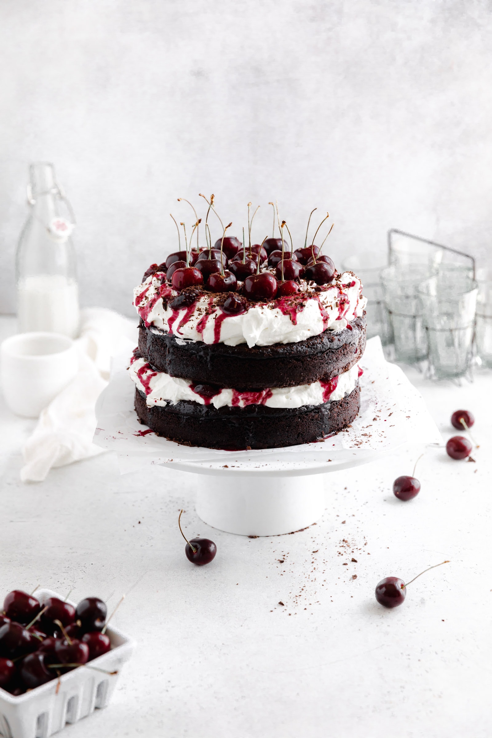 black forest cake with whipped cream with cherries