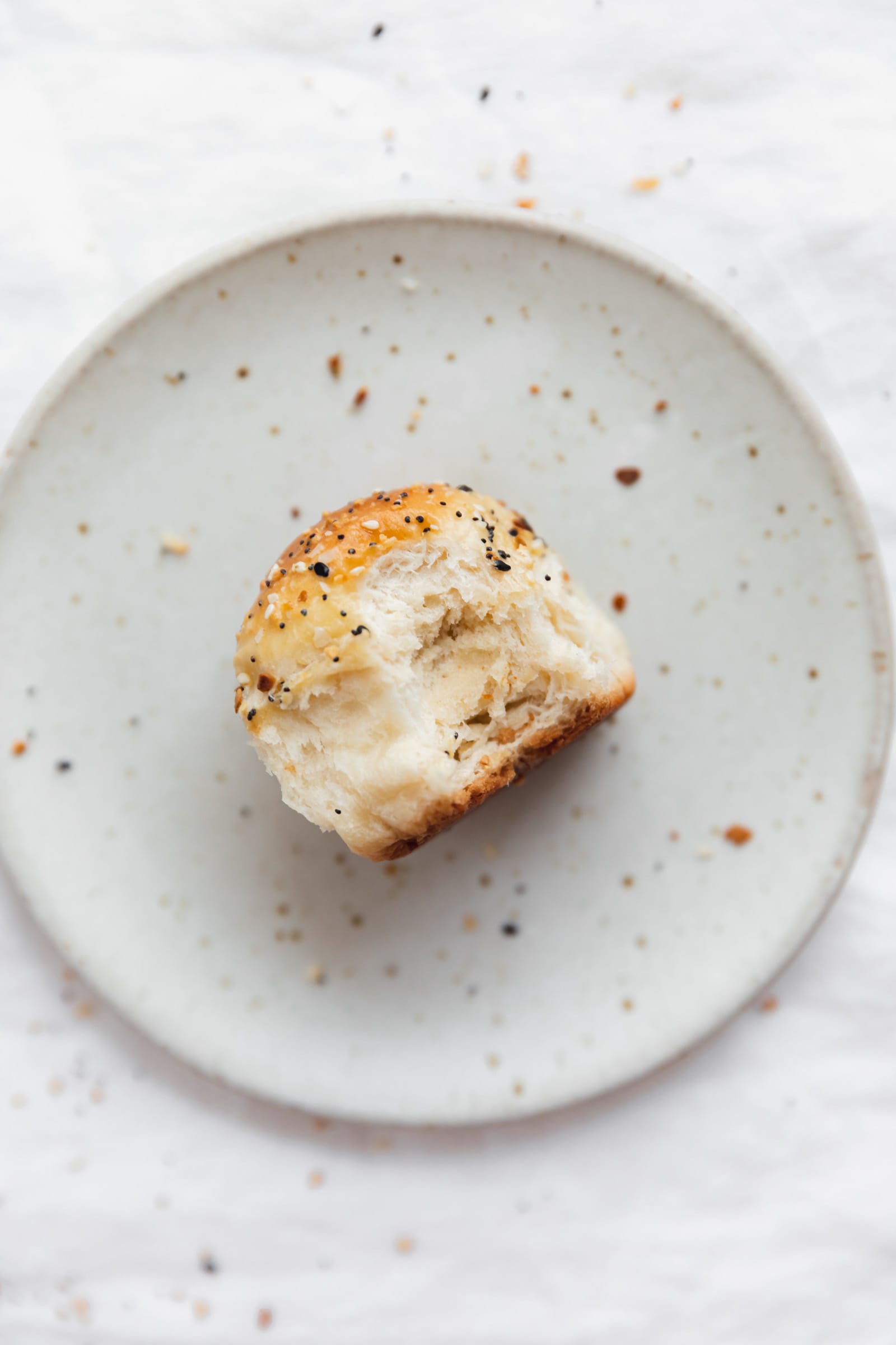 parker house dinner roll on a plate