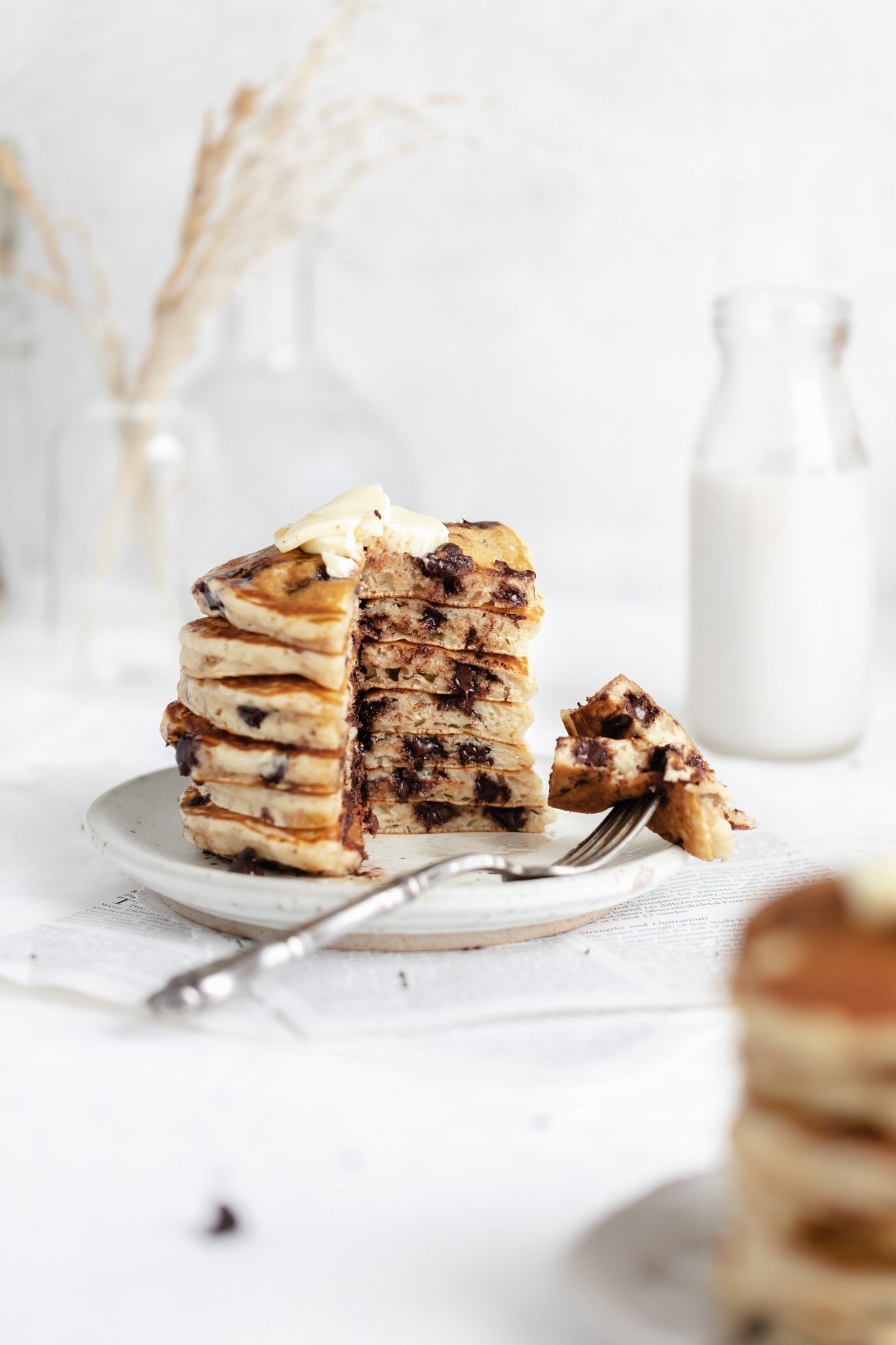 chocolate chip pancakes with a bite taken out