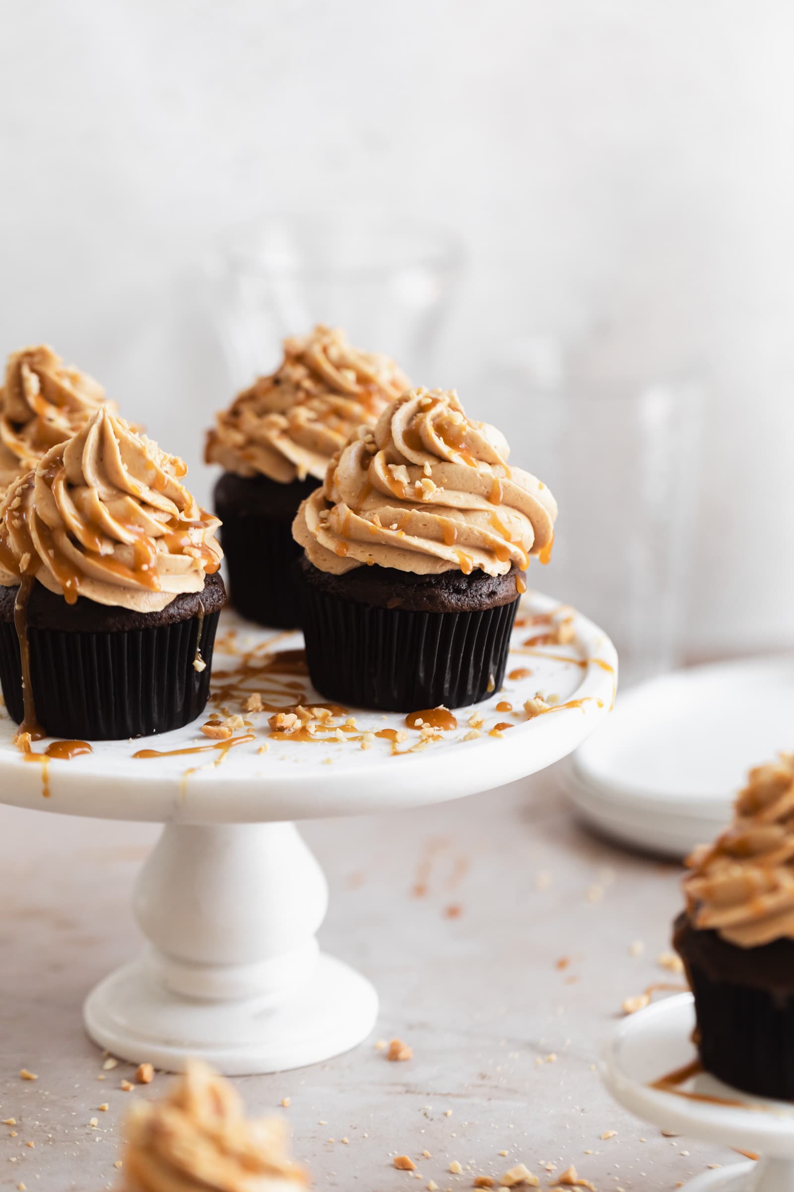 chocolate peanut butter cupcakes with caramel drizzle