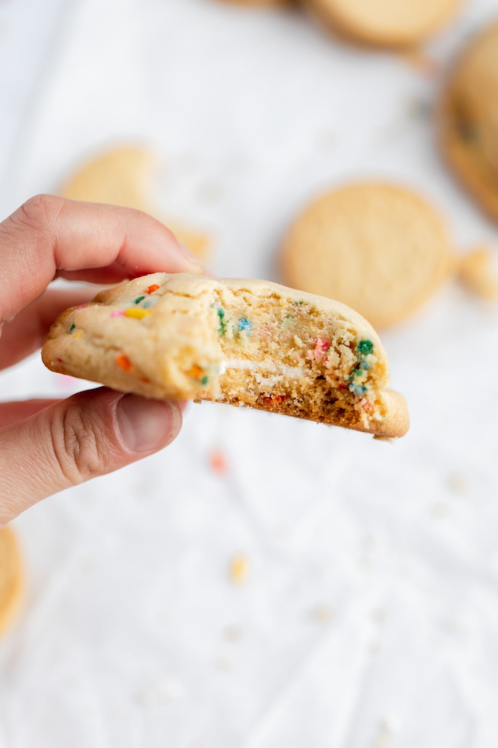 funfetti cookie wtih an oreo in the middle