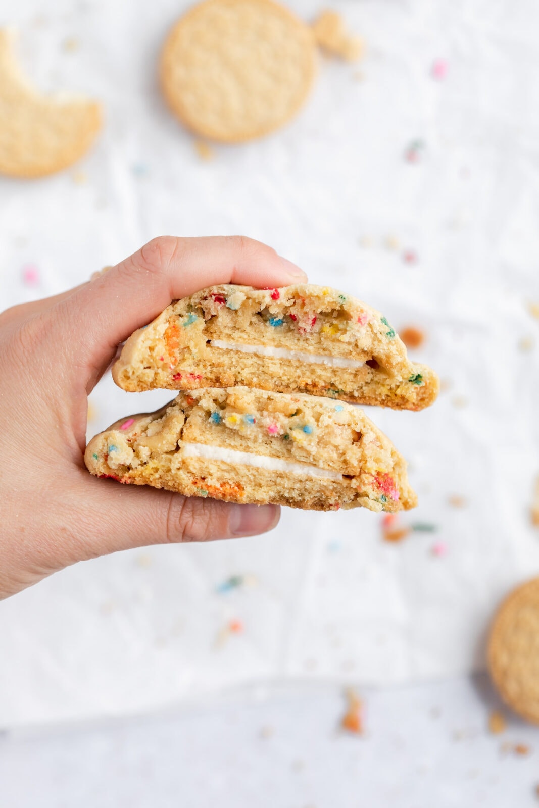 Oreo funfetti cookies cut in half