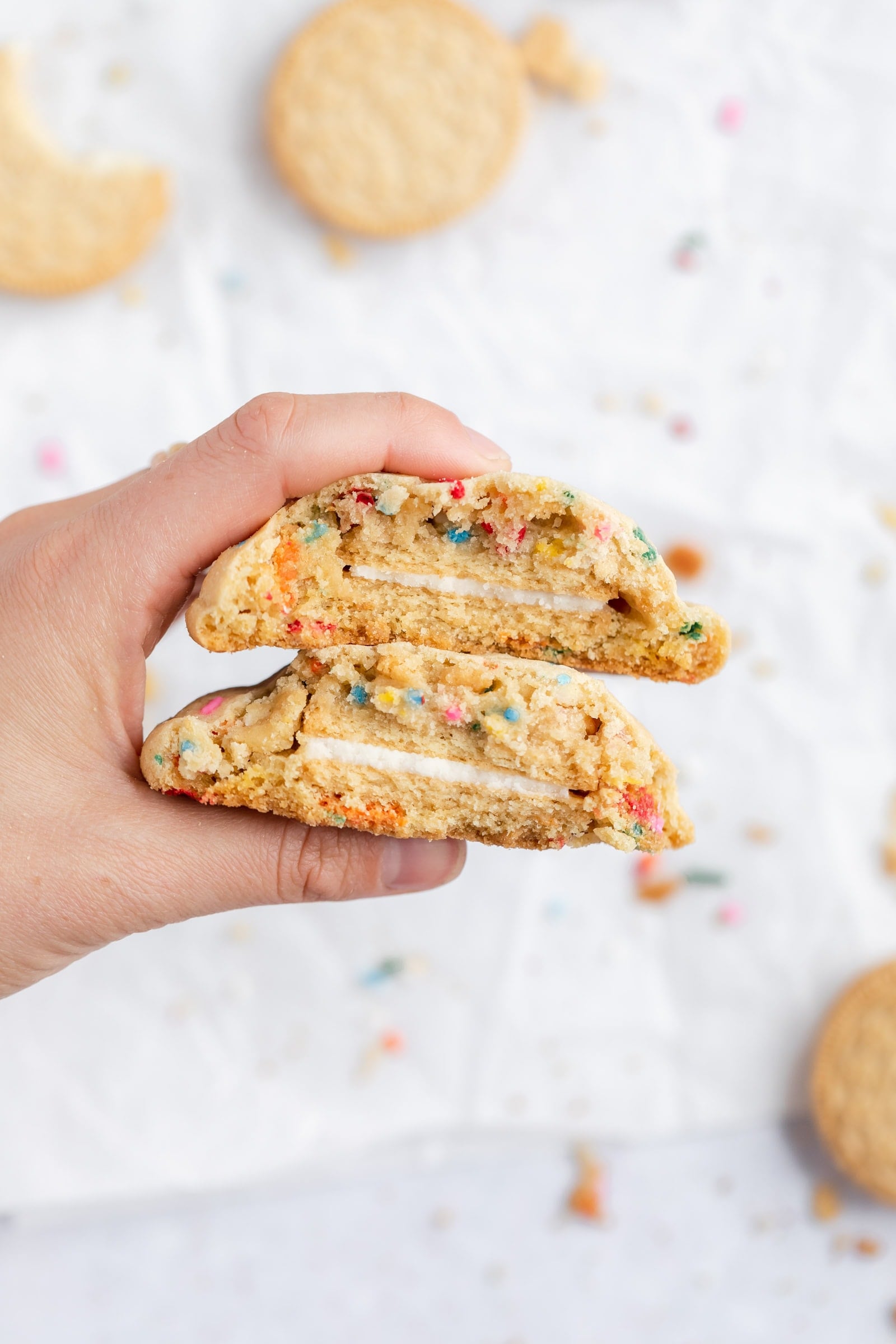 Oreo funfetti cookies cut in half