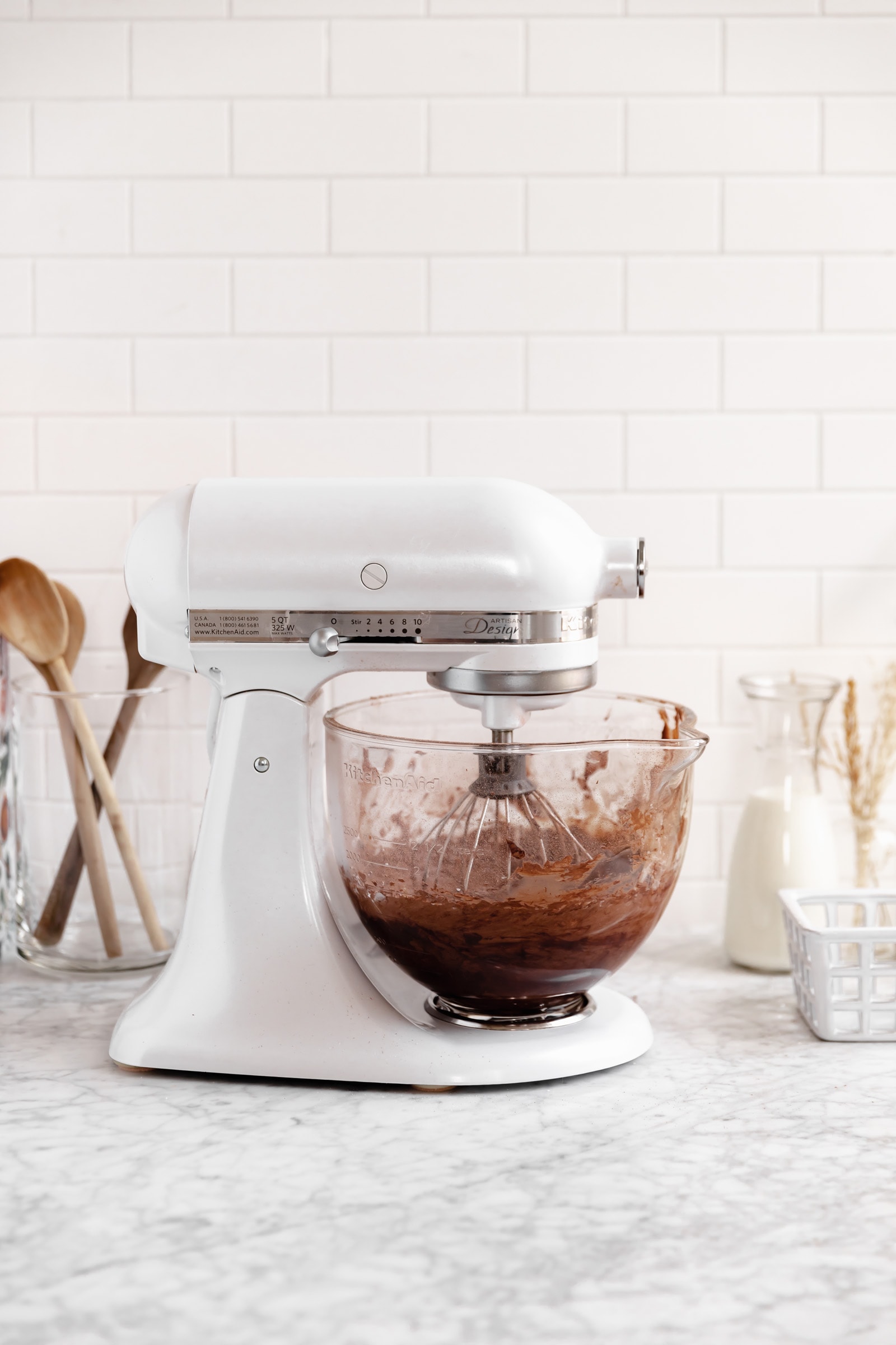 chocolate frosting in a stand mixer