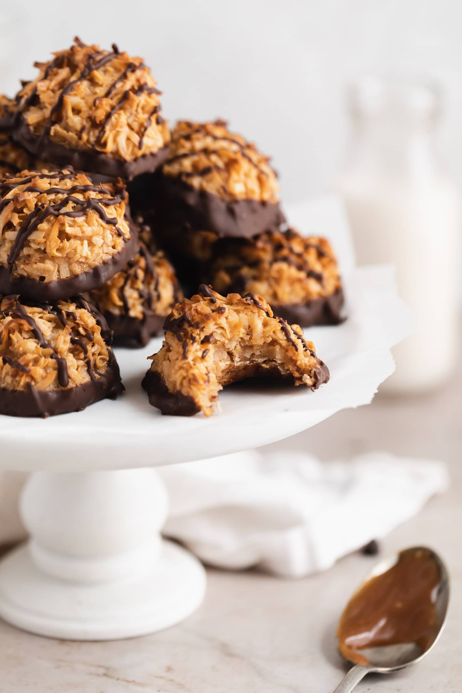 samoa macaroons on a cake stand
