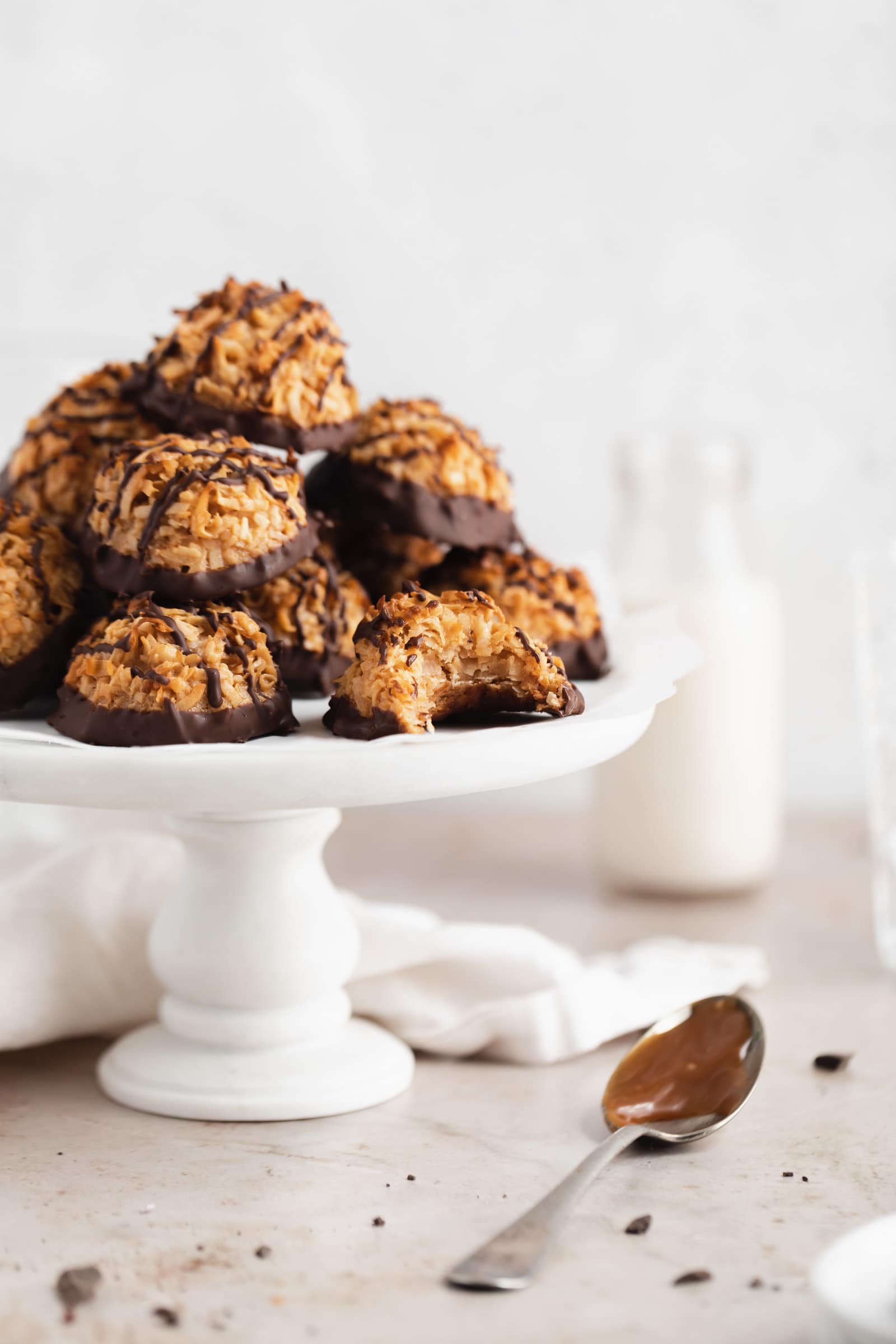 caramel coconut macaroons on a cake stand