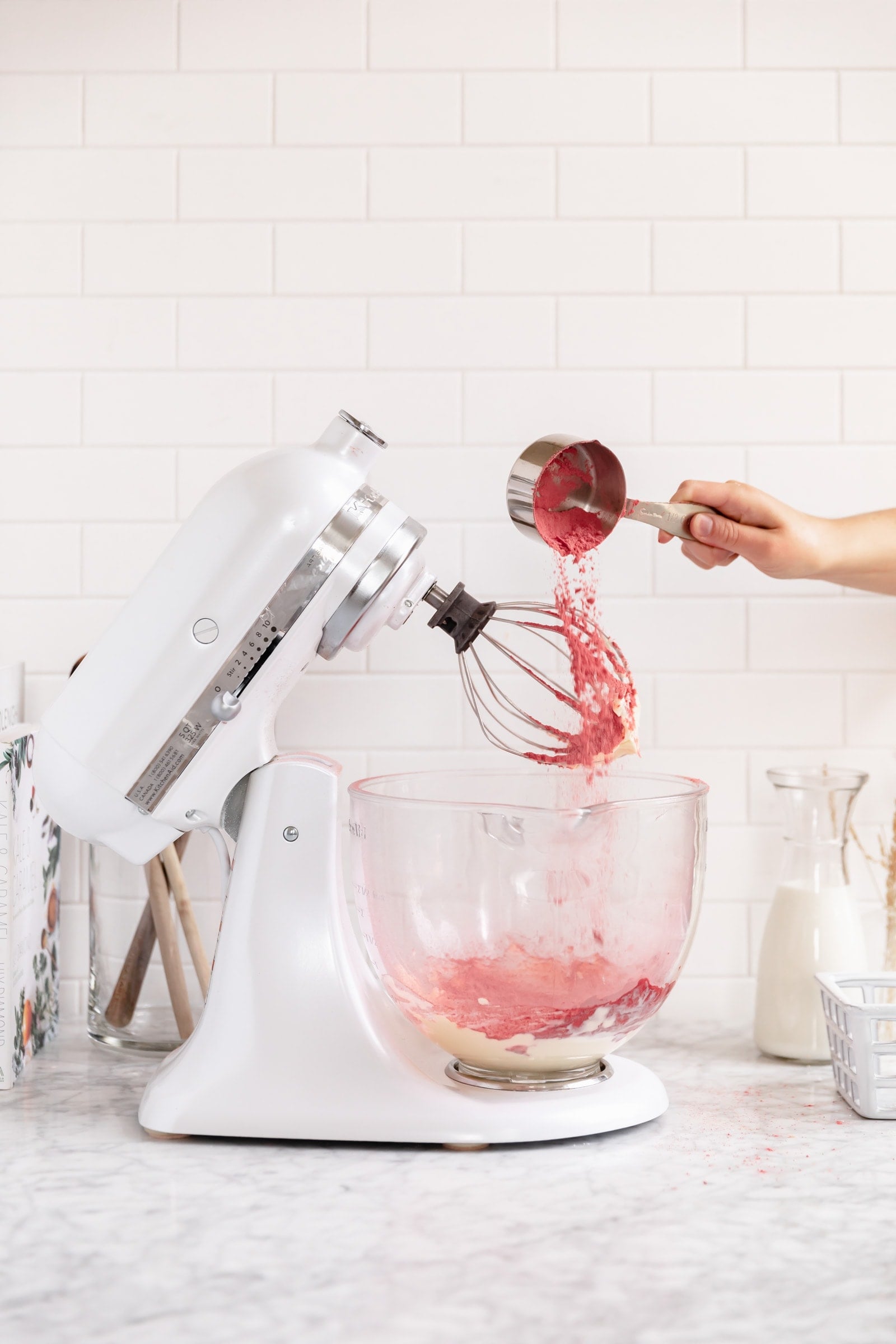 strawberry powder pouring into bowl