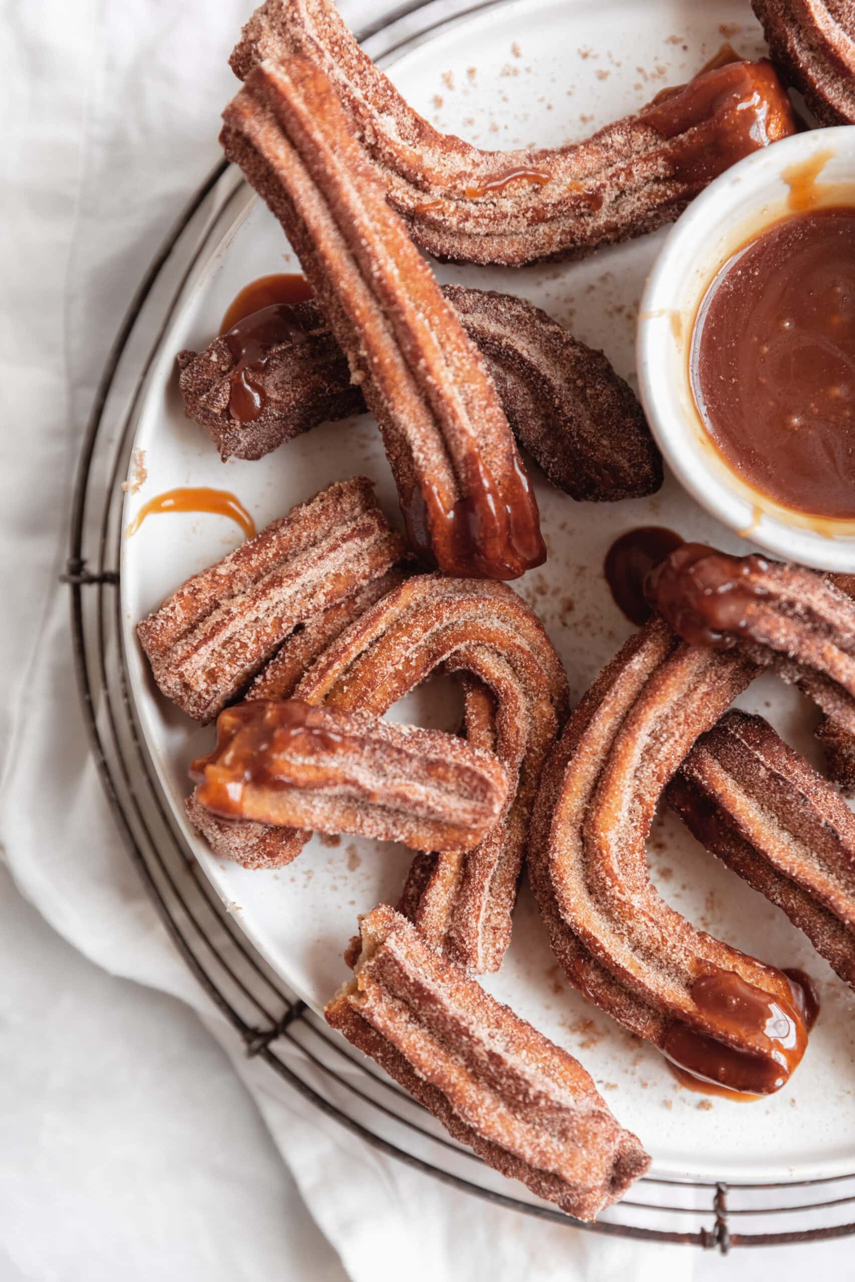 cinnamon sugar apple churros with caramel