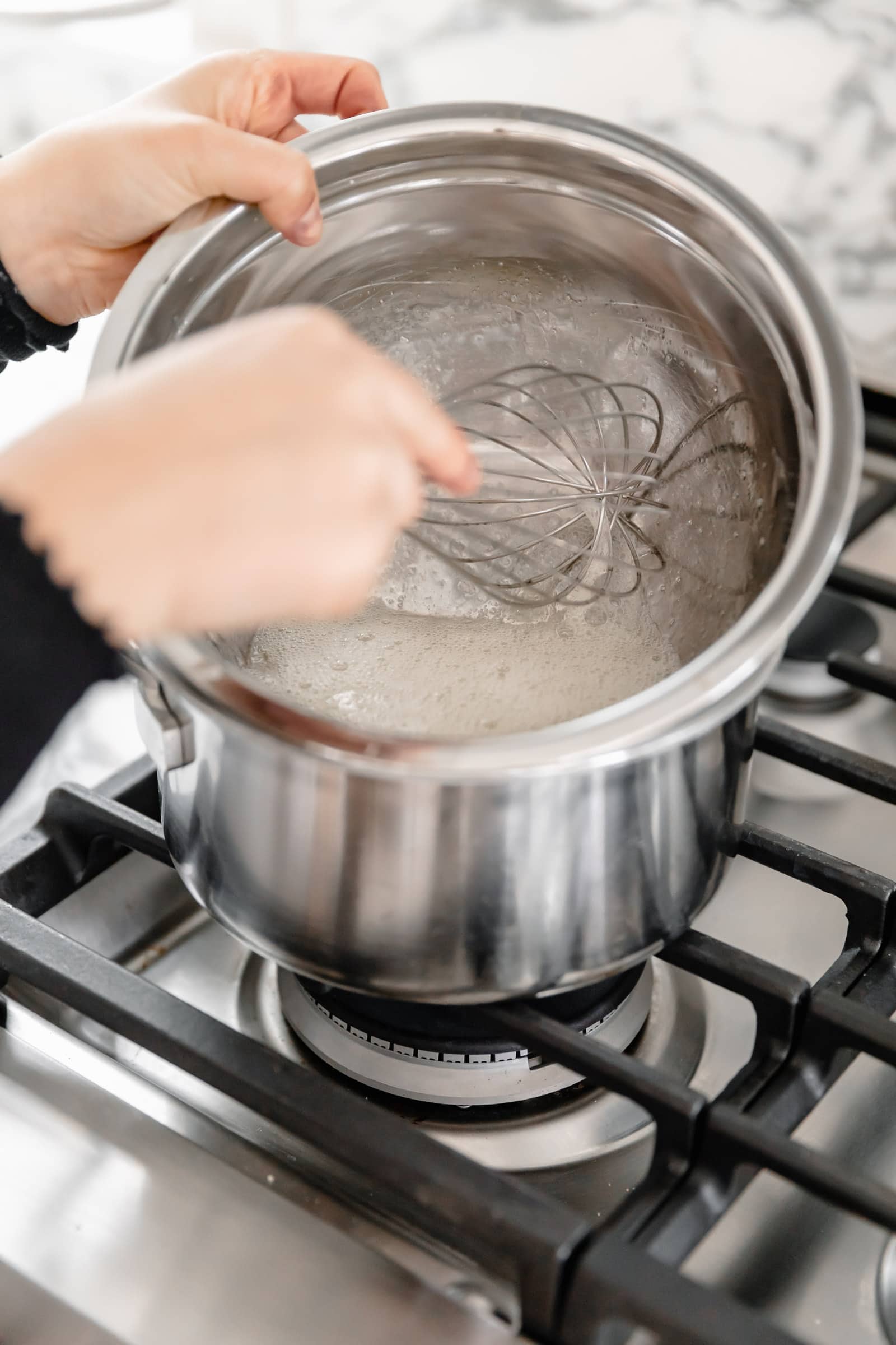 whisking egg whites in bowl