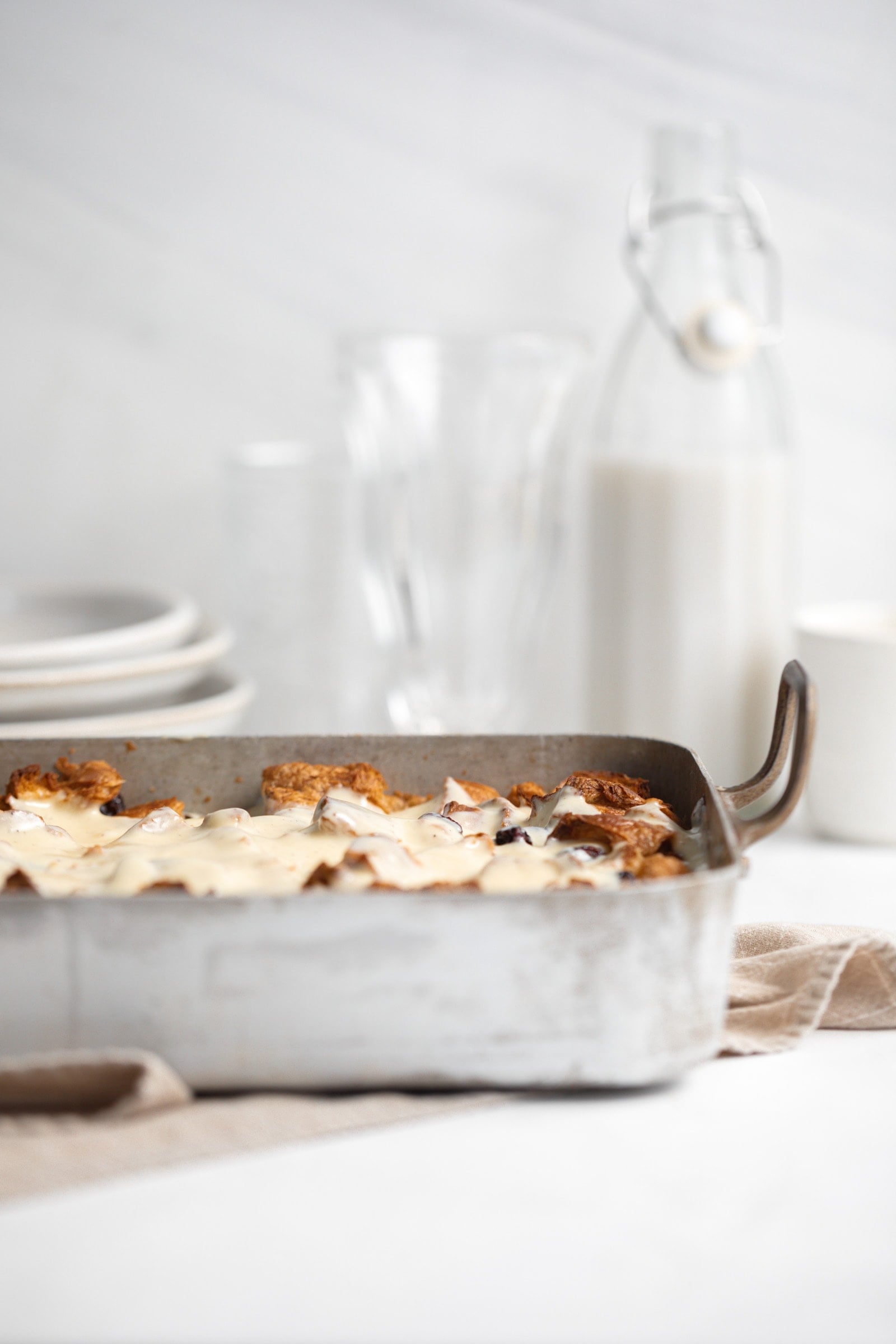 rum raisin bread pudding in a pan